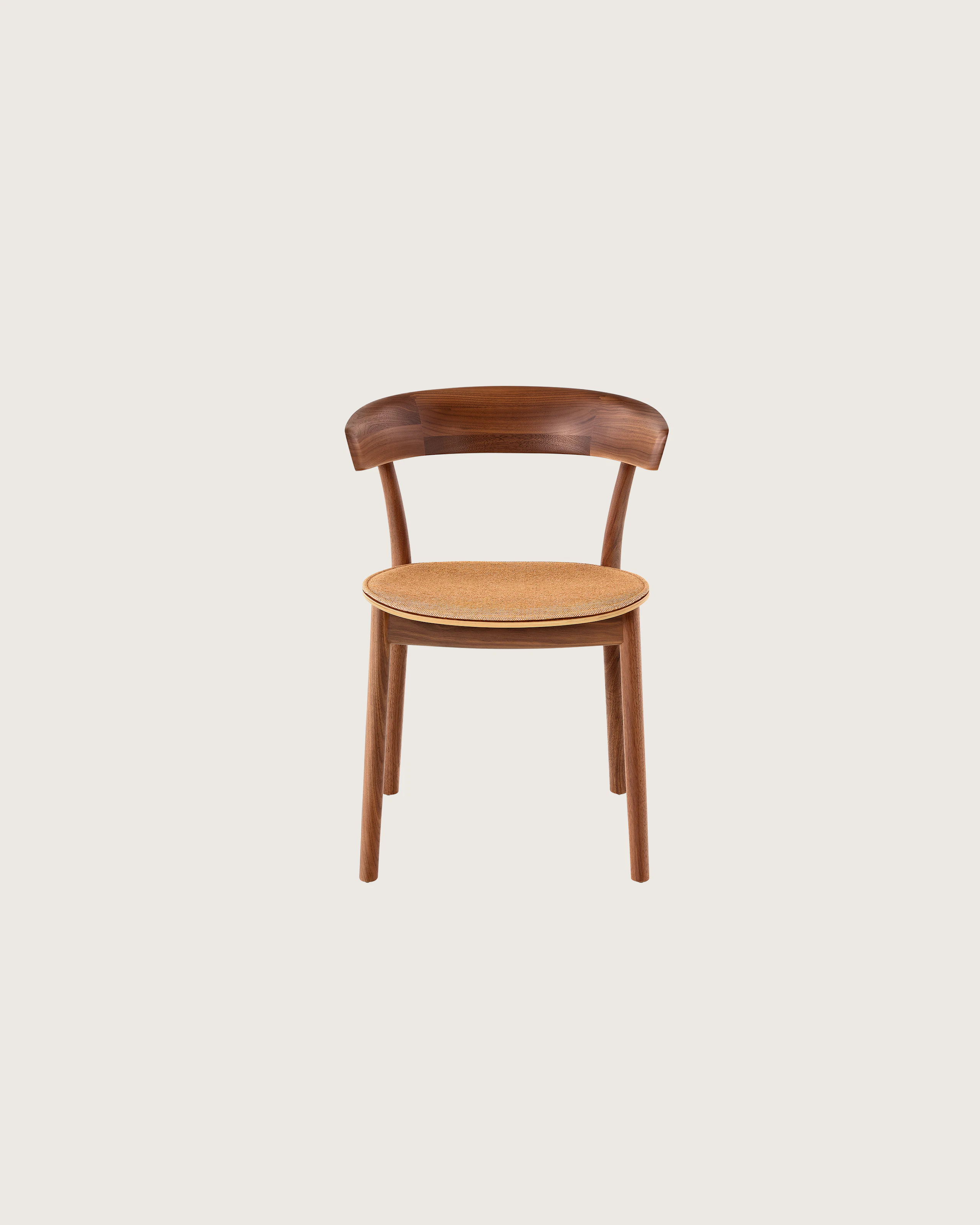 A Leeway Chair with a Walnut frame, featuring a copper colored upholstered seat, viewed from the front.