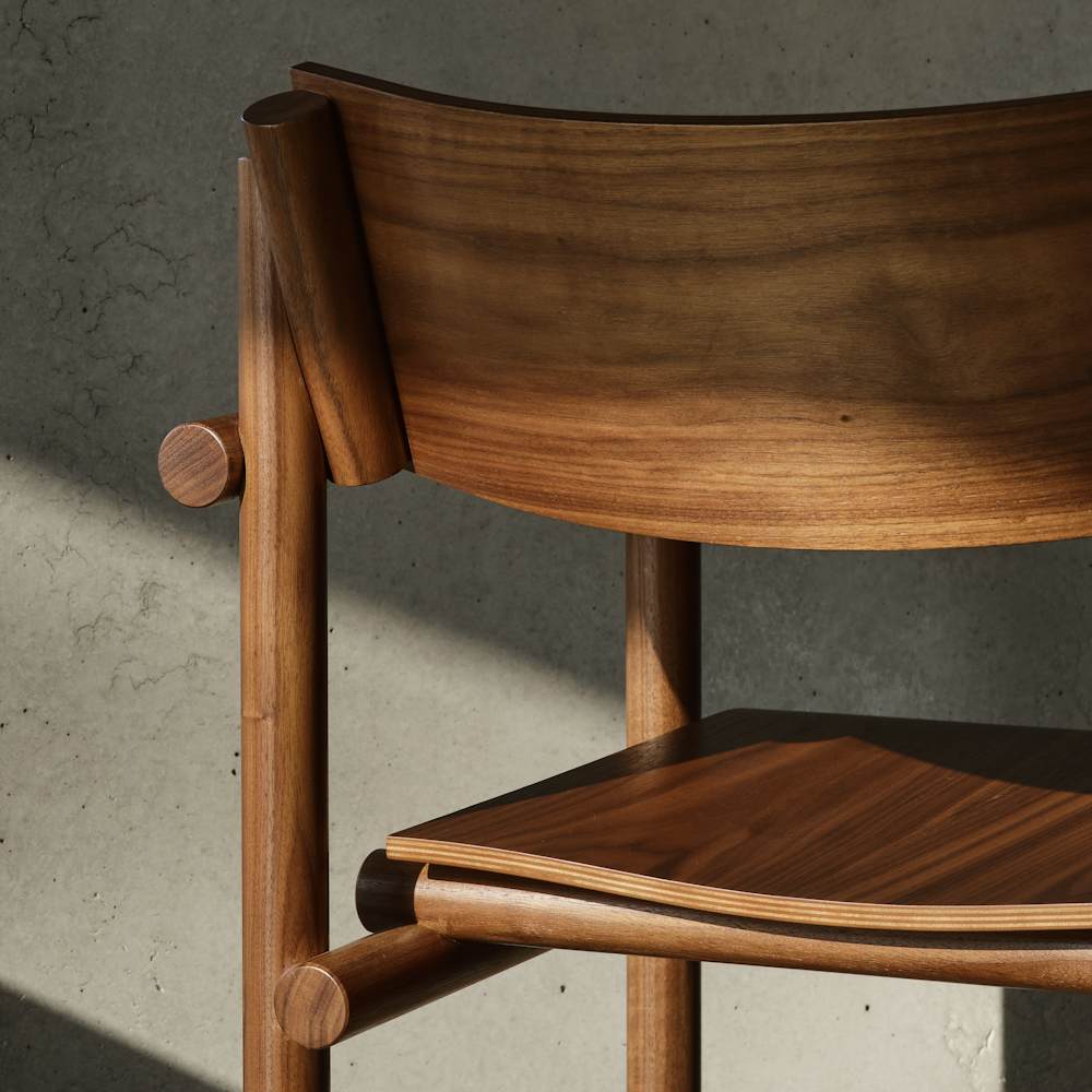 Muecke Muecke Dining chair in walnut detailDining Collection