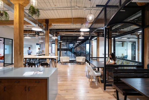 rockwell unscripted tall table easy stools coworking space breakout space rockwell unscripted club chair café space saarinen executive chairs