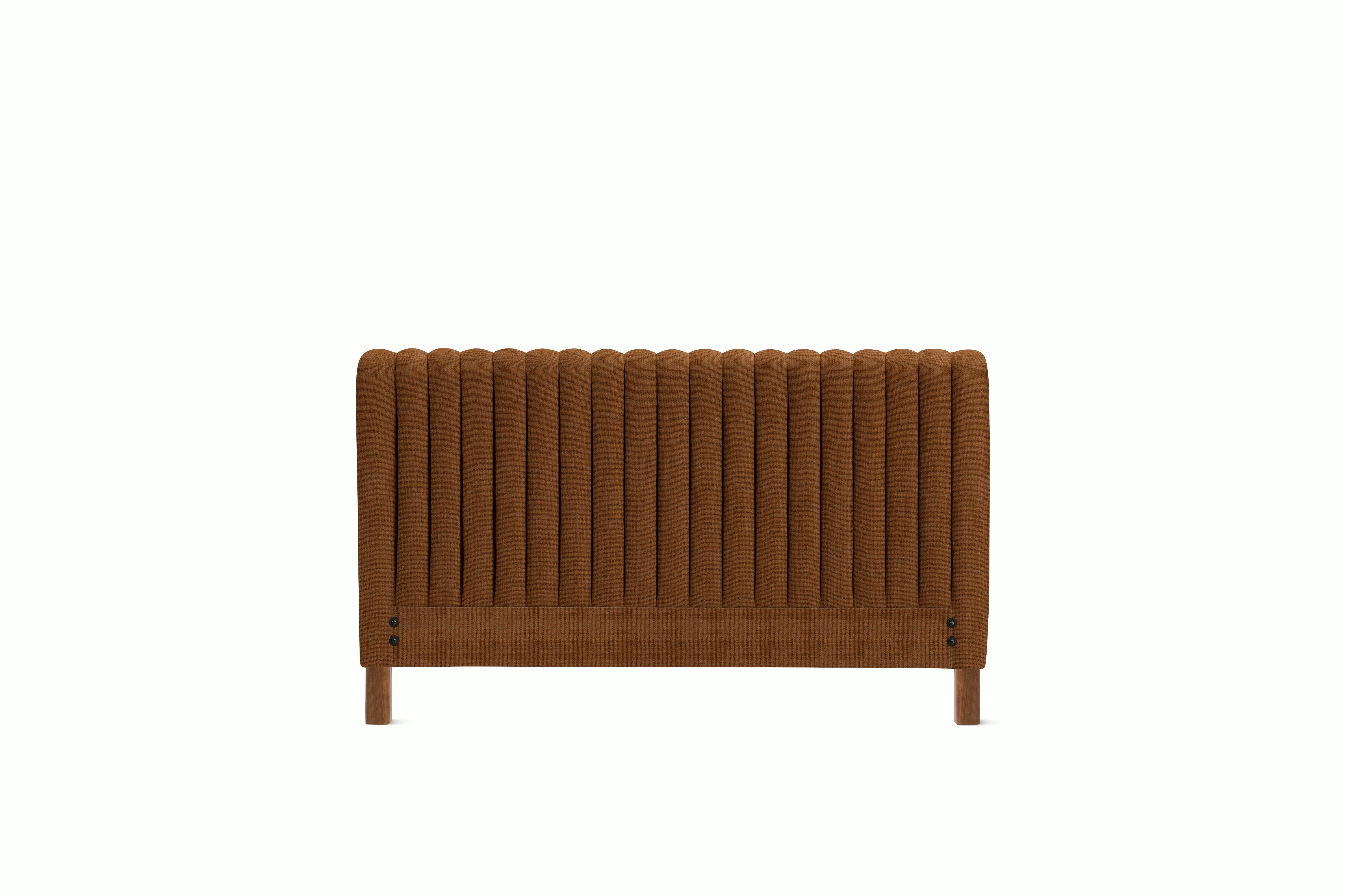 A Charlotte Headboard in Cannella viewed from an angle.