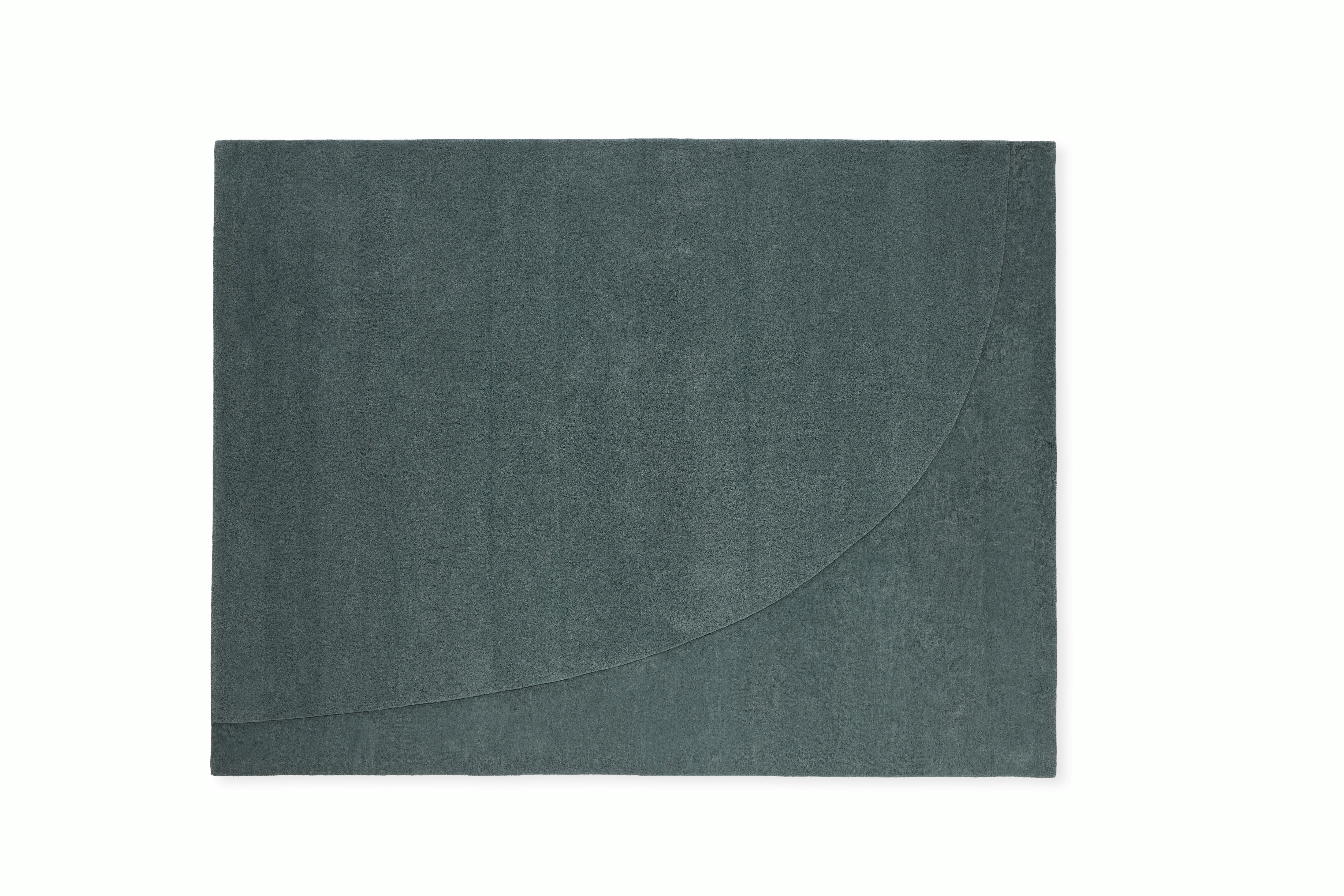 A Simple Curve Rug in Light Blue viewed from the front.