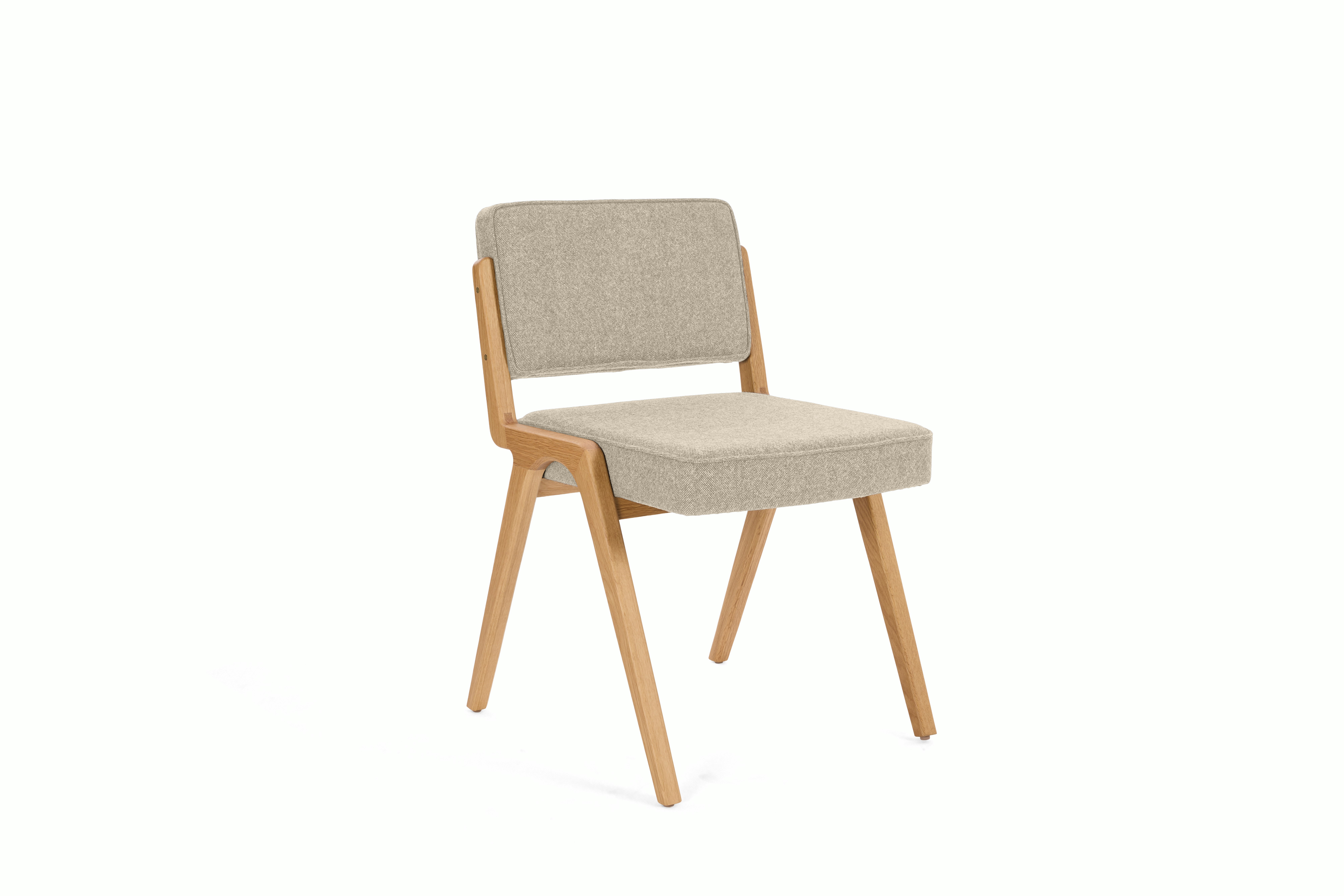 A Eugenio Dining Chair in patisserie, oak viewed from an angle.