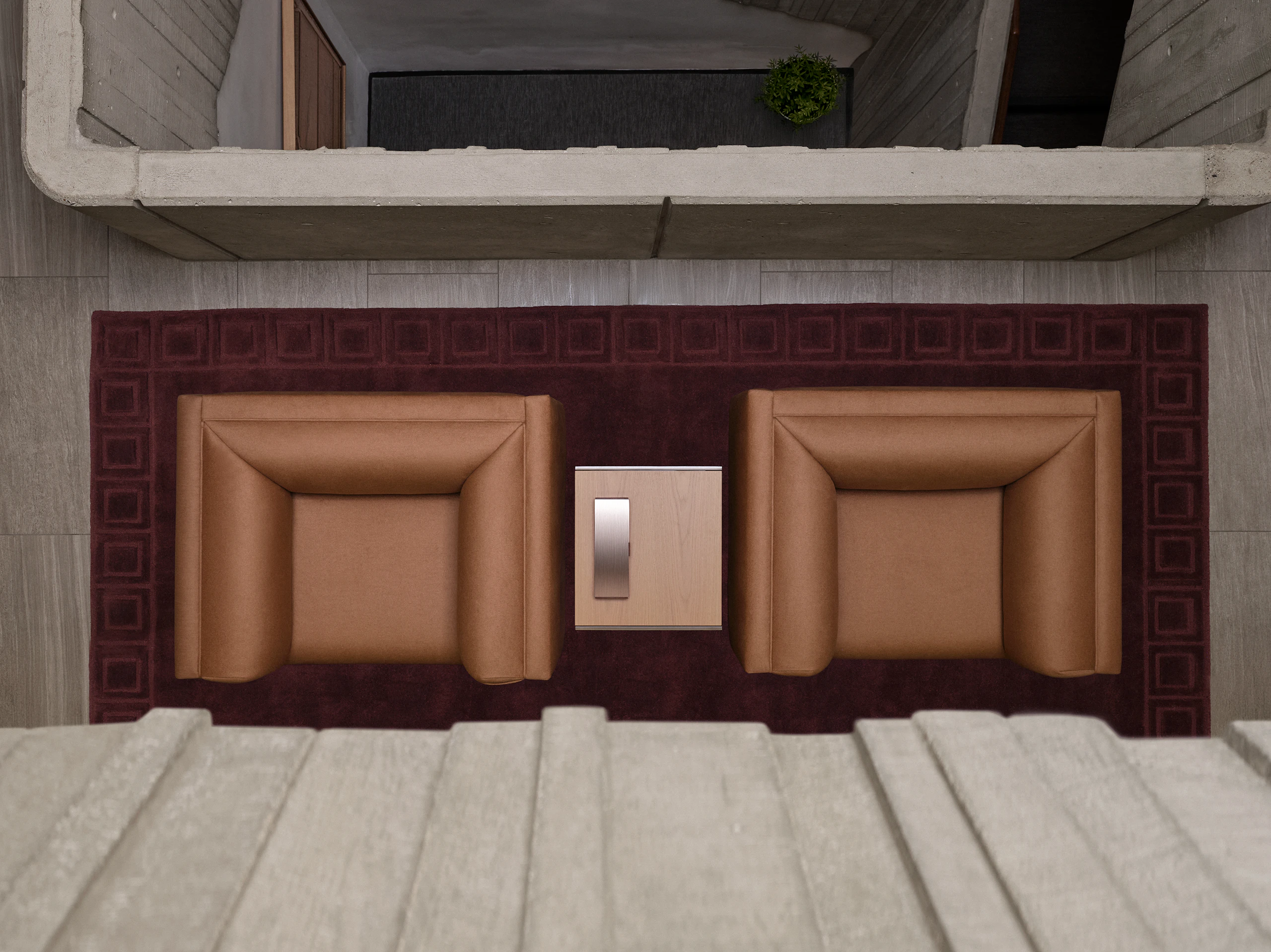 Two Rolled Arm Sofas upholstered with Brushed Camel in Natural with an H Frame Side Table with a Nordic Oak top between them, viewed from above on a burgundy rug.