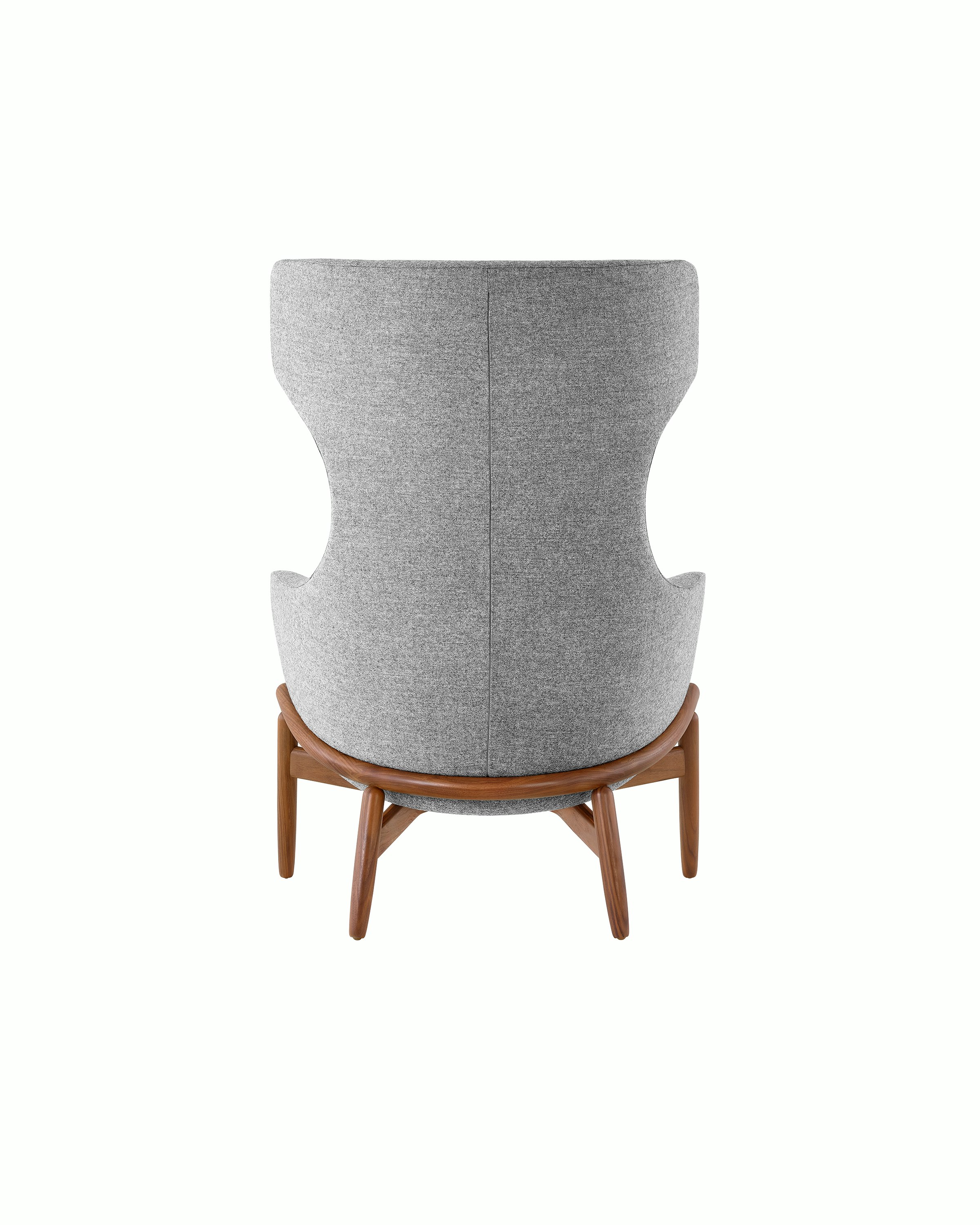 A wing-back Reframe Lounge Chair in Panno Di Dolce Flannel, viewed from behind.