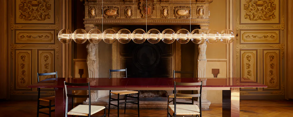 Luce Sferica Pendant in a dining room setting
