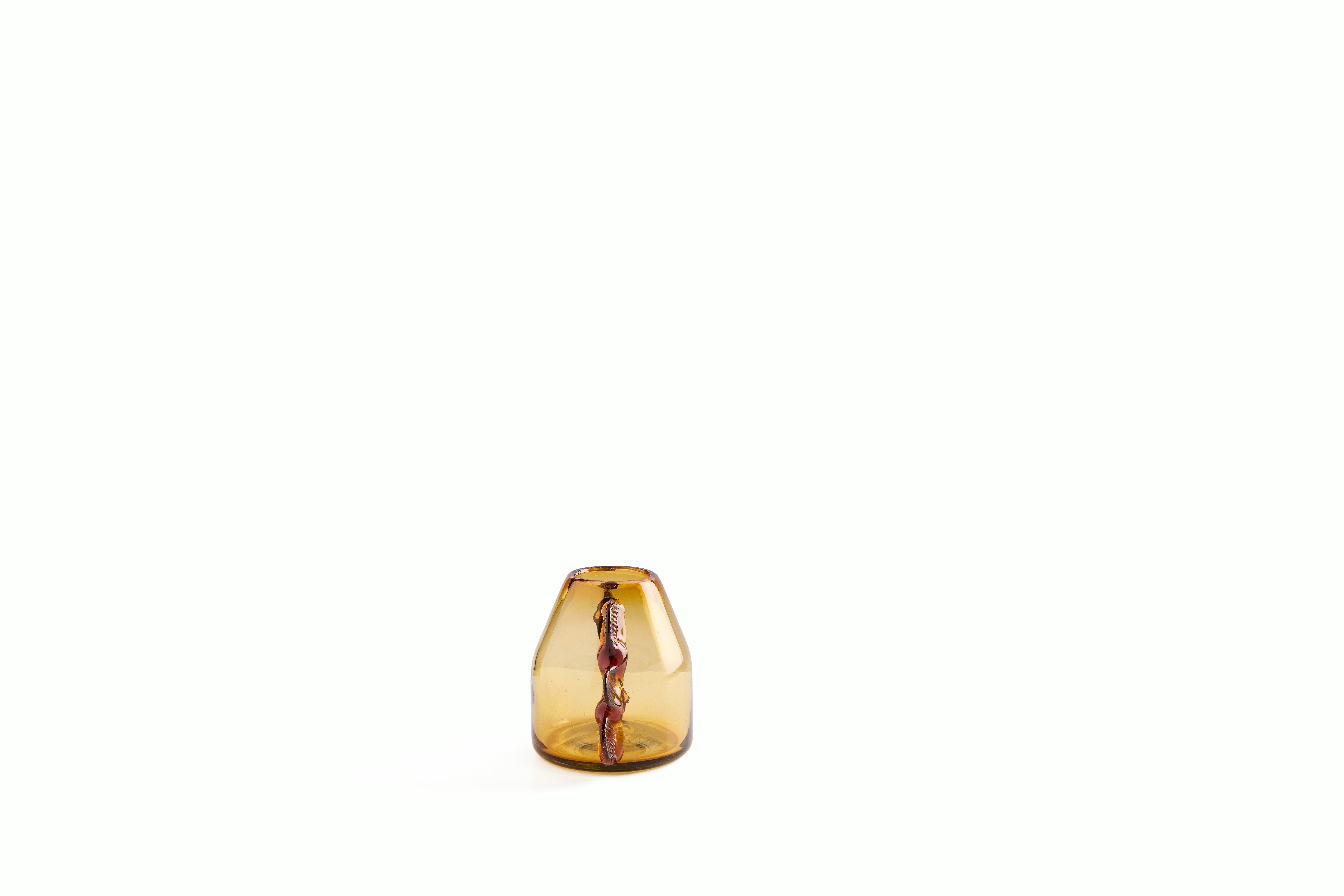 A Dalia Bud Vase in Amber viewed from the side.