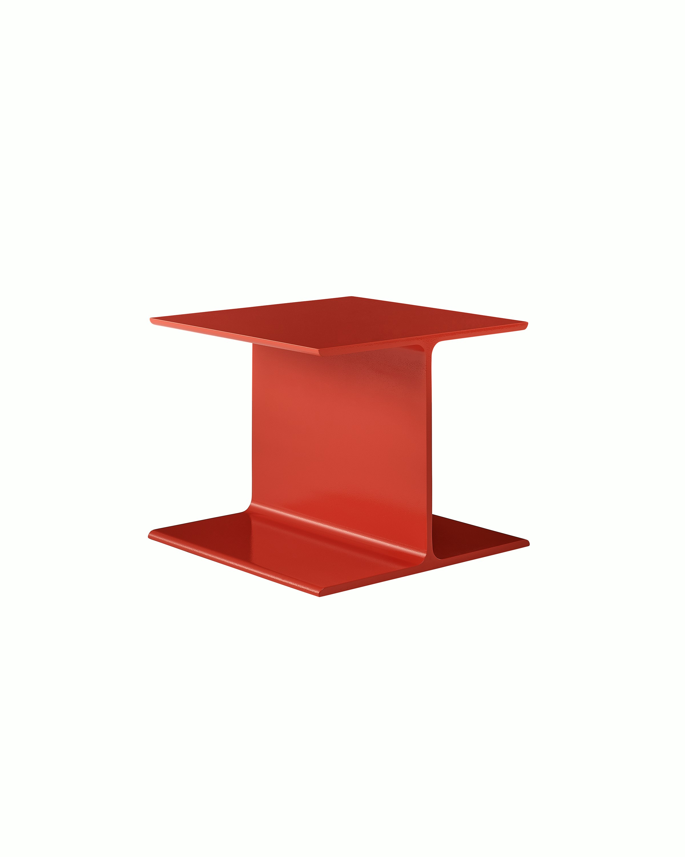 I Beam Side Table designed by Ward Bennett in International Orange, shown at a front angle on a white sweep.