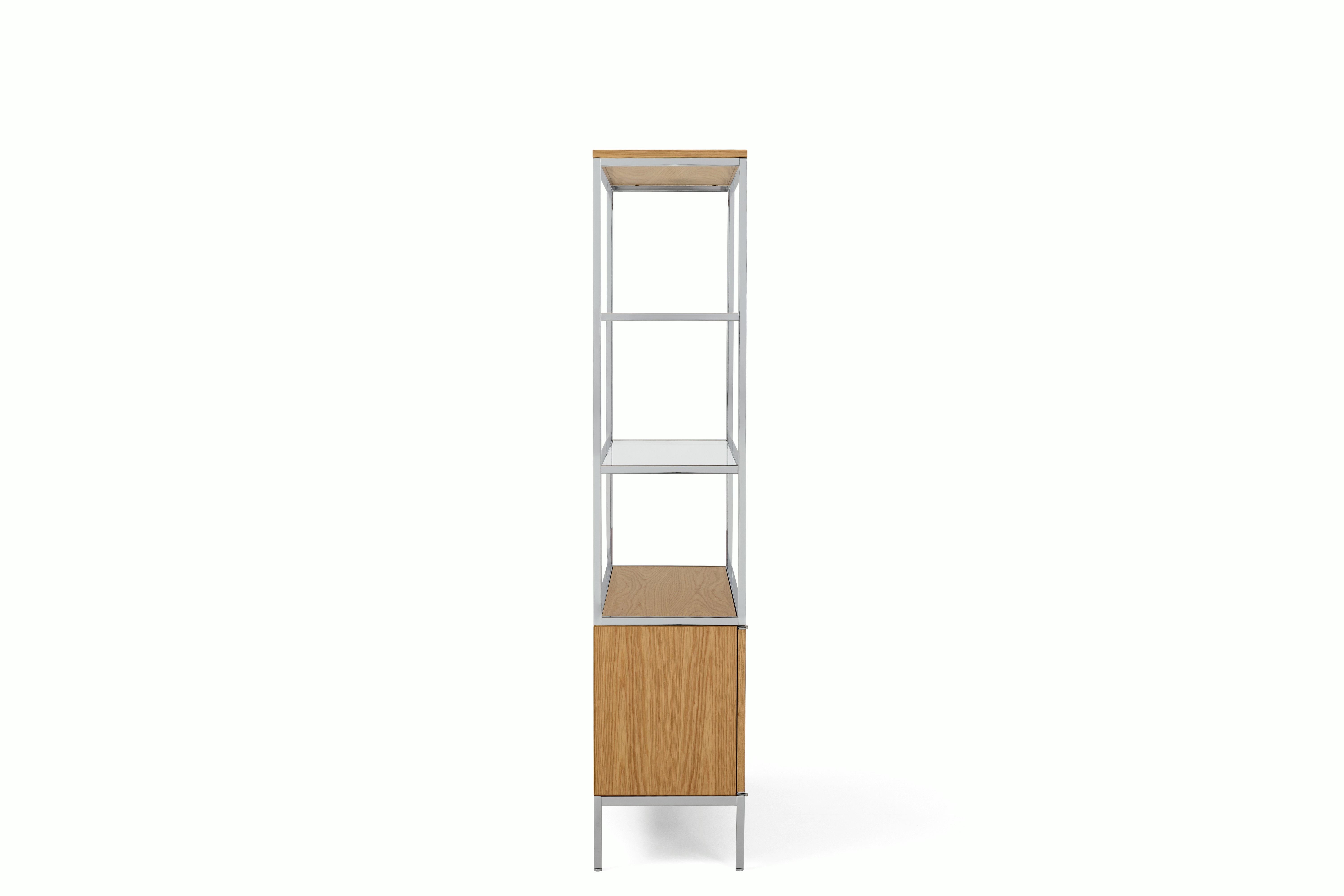 A Knoll Chermayeff Bookcase in Oak viewed from the side.