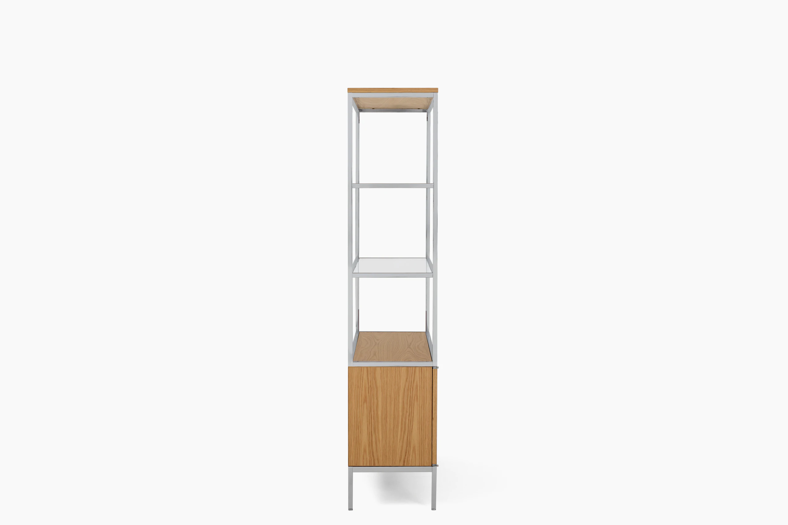 A Knoll Chermayeff Bookcase in Oak viewed from the side.