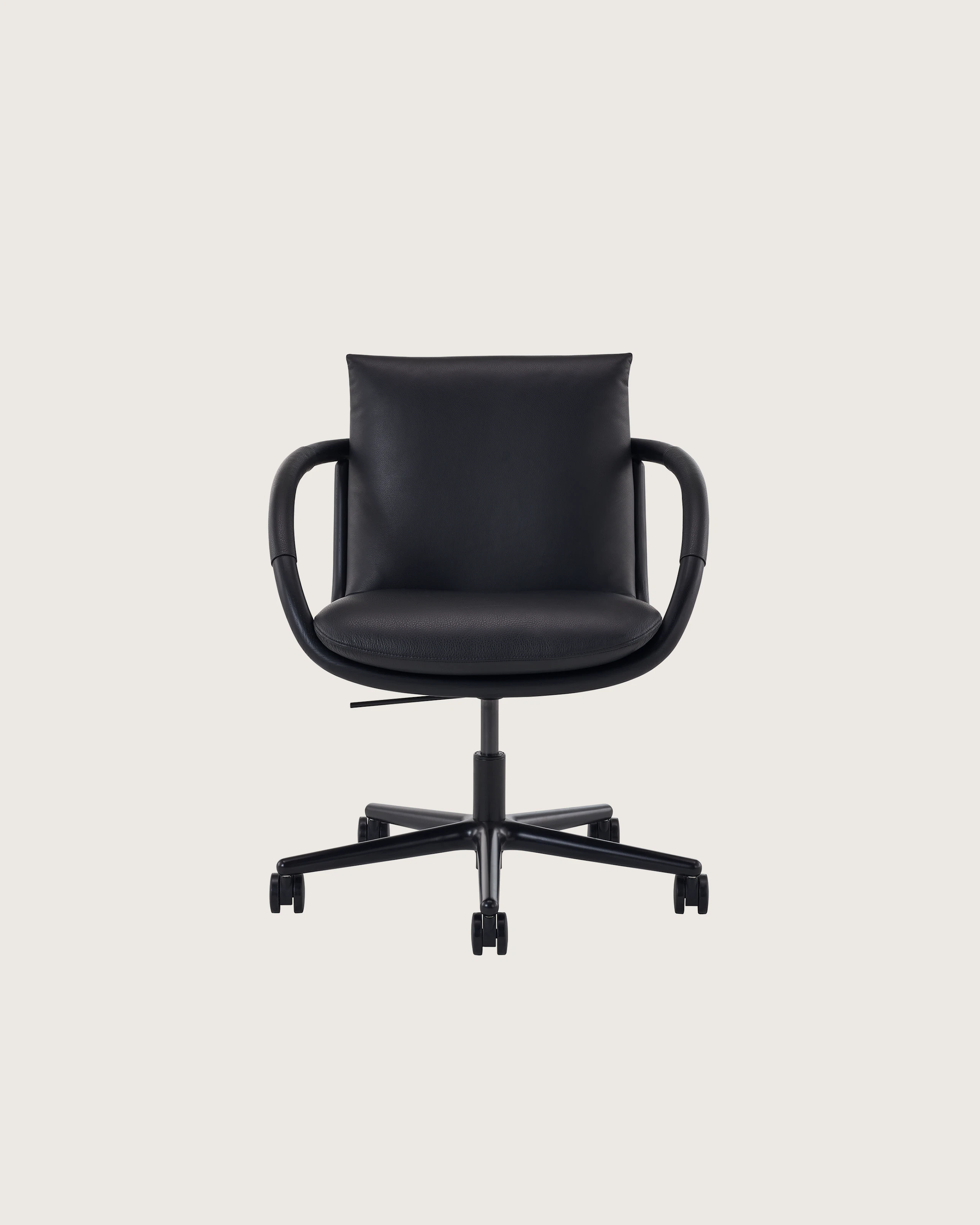 Full Loop Office Chair in Ebony and Black Leather on a black base with casters.