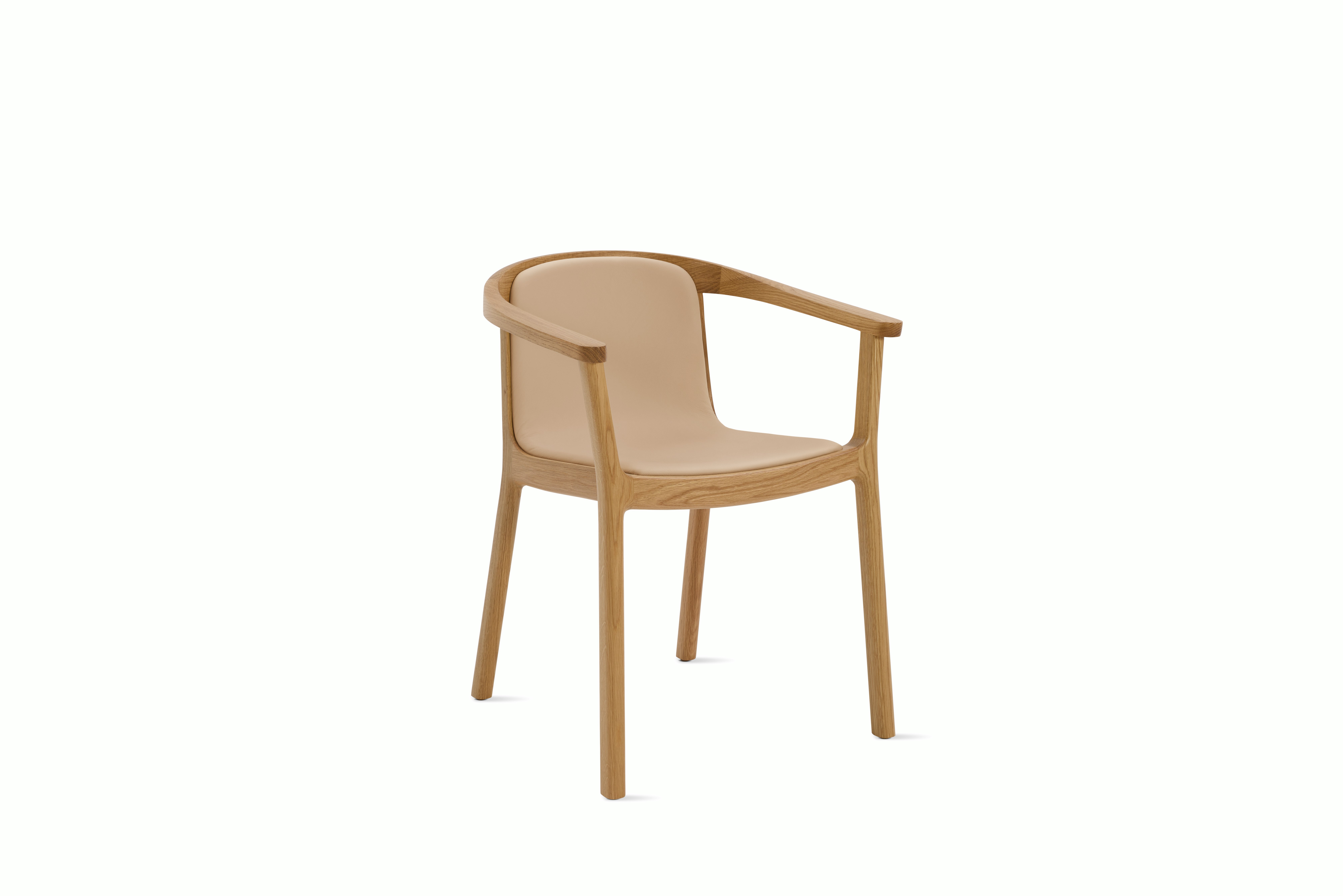 A Lijn Armchair in Balsa Oak viewed from an angle.