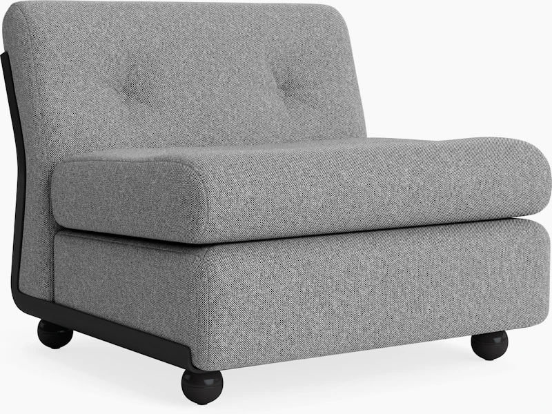 Single-seat gray upholstered Amanta sofa with sculpted cushions and black legs, front angle.