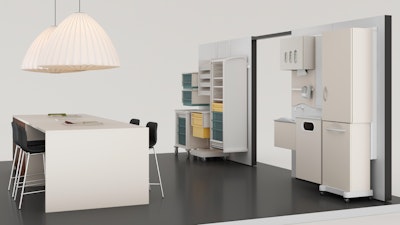 A room furnished with a Compass System by Herman Miller, multi-color supply and procedure carts, and a large white table surrounded by four black counter-height chairs.