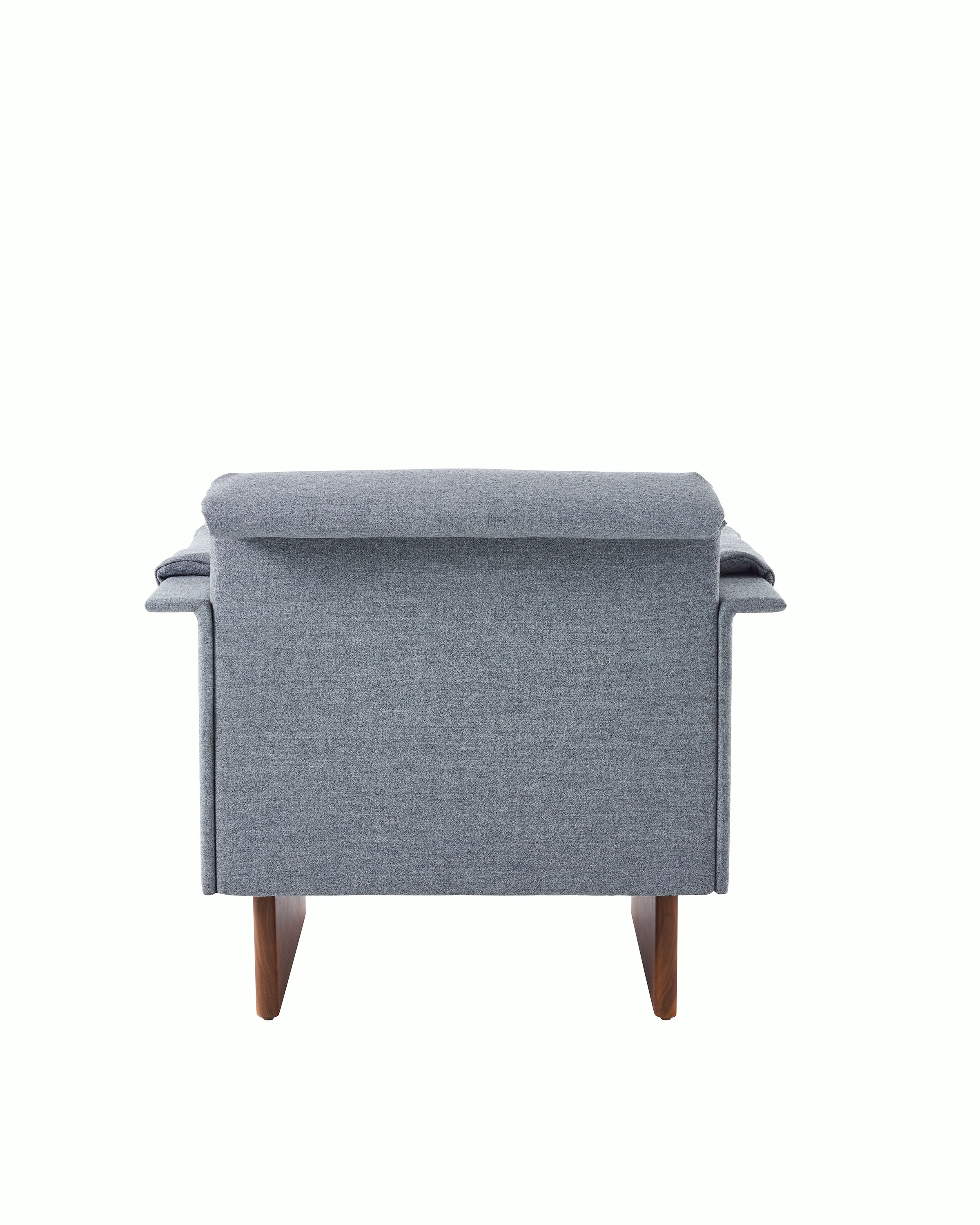 Mantle Club Chair in Panno di Dulce Flannel with a Walnut Base, viewed from the back.