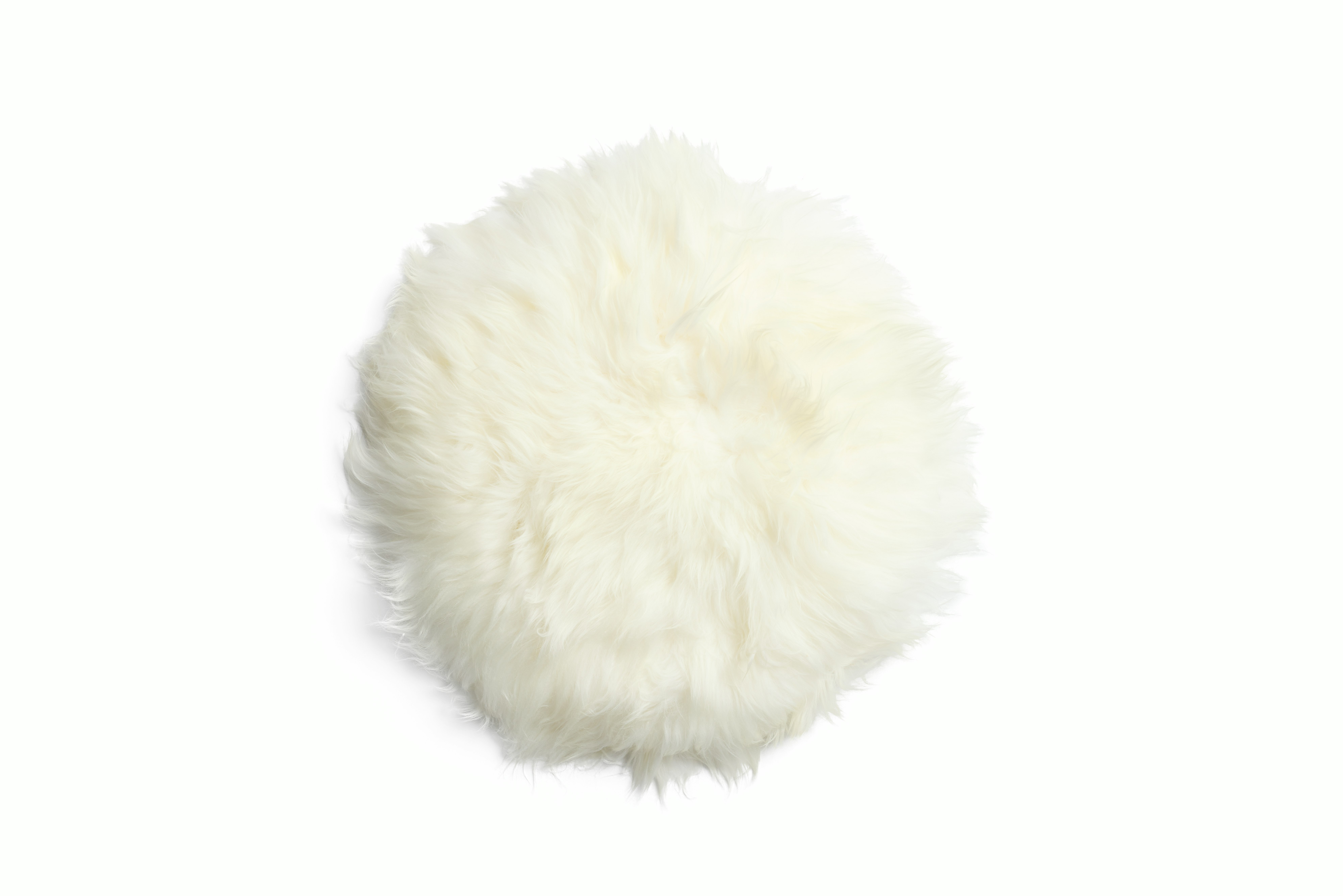 A Sheepskin Seat Throw in Ivory Viewed from the front.