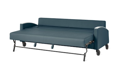 A front three-quarter view of a blue Gemma Double Sleep Sofa by Herman Miller in the bed configuration.