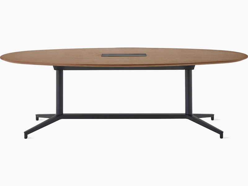 An oval Y base Headway conference table with a medium wood top and black base.