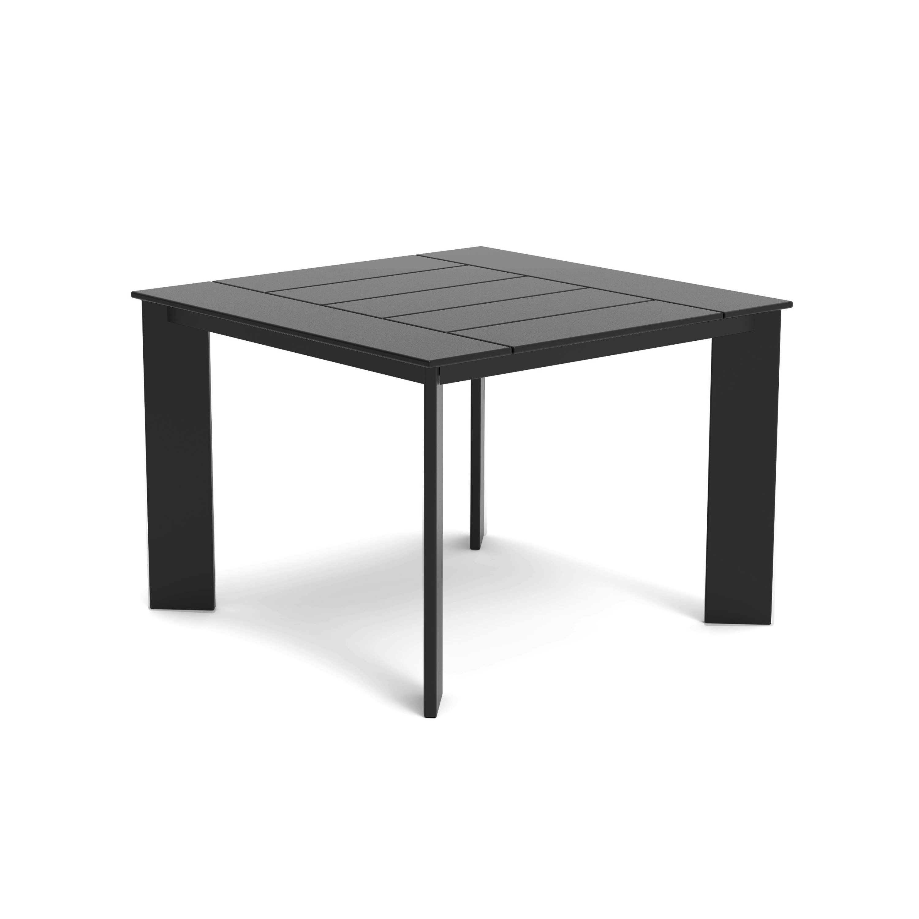 A Here and There Dining Table in Black viewed from an angle.