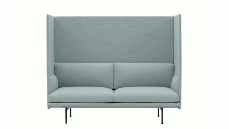 Outline Highback Sofa by Muuto with winged sides, wide seat cushions, and slim black metal legs in light blue fabric.