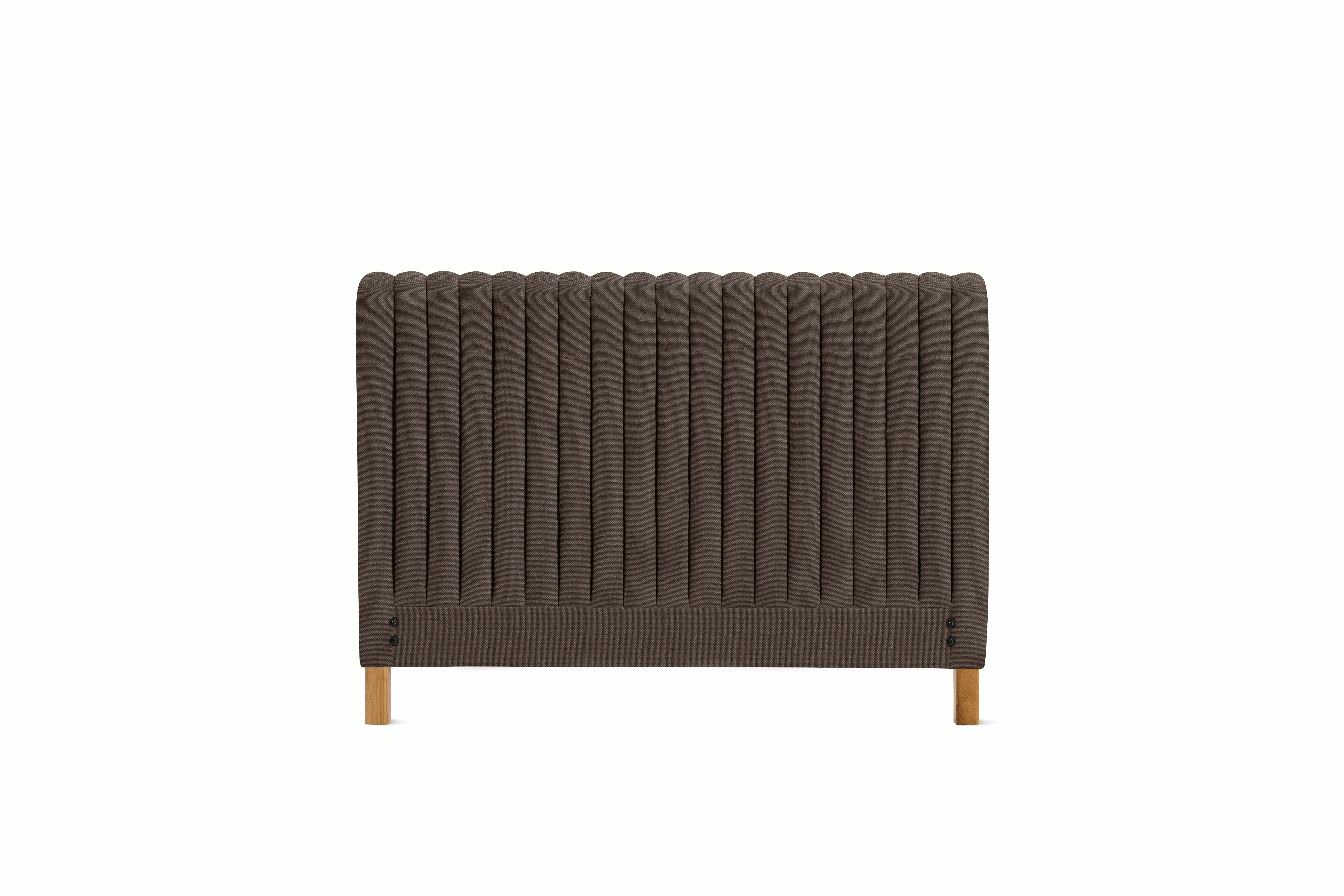 A Charlotte Headboard in Hollow viewed from an angle.
