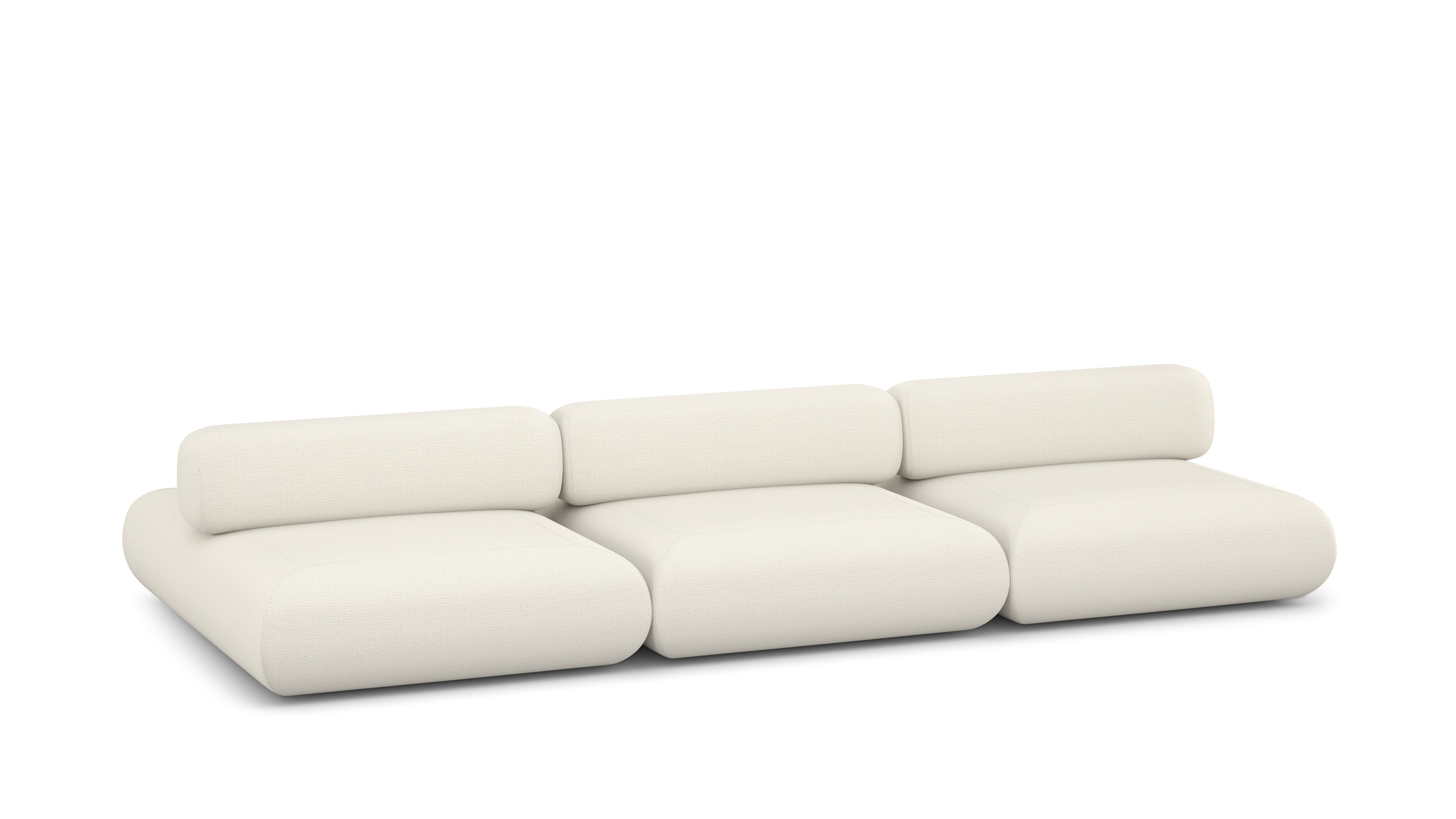 A Sval Double Sided Sofa in Ecru viewed from an angle.