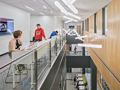 Students using the third-floor atrium that overlooks Ferris Esports