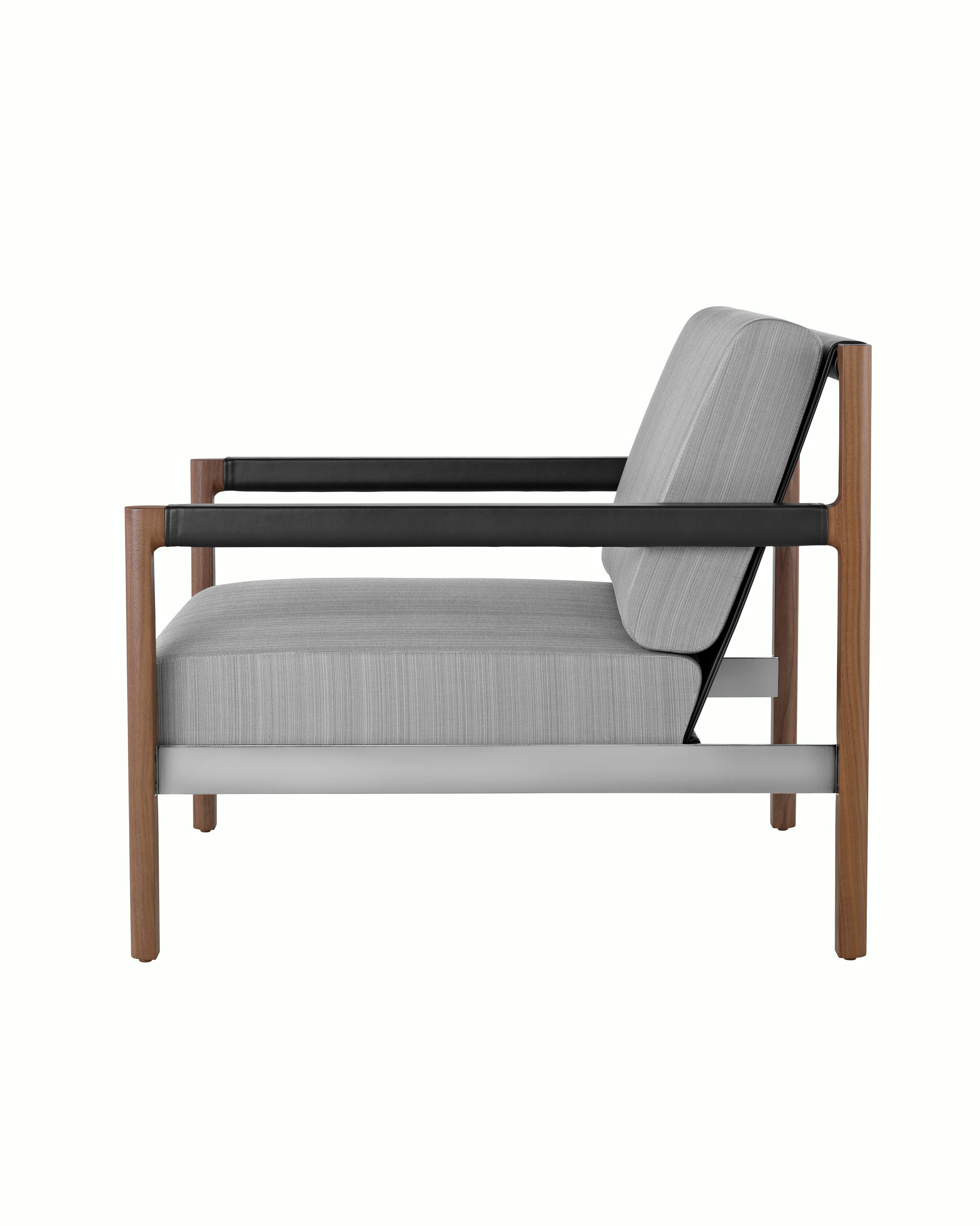 A Brabo Club Chair with light gray upholstery, leather and metal accents, and an exposed wood frame. Viewed from the side.