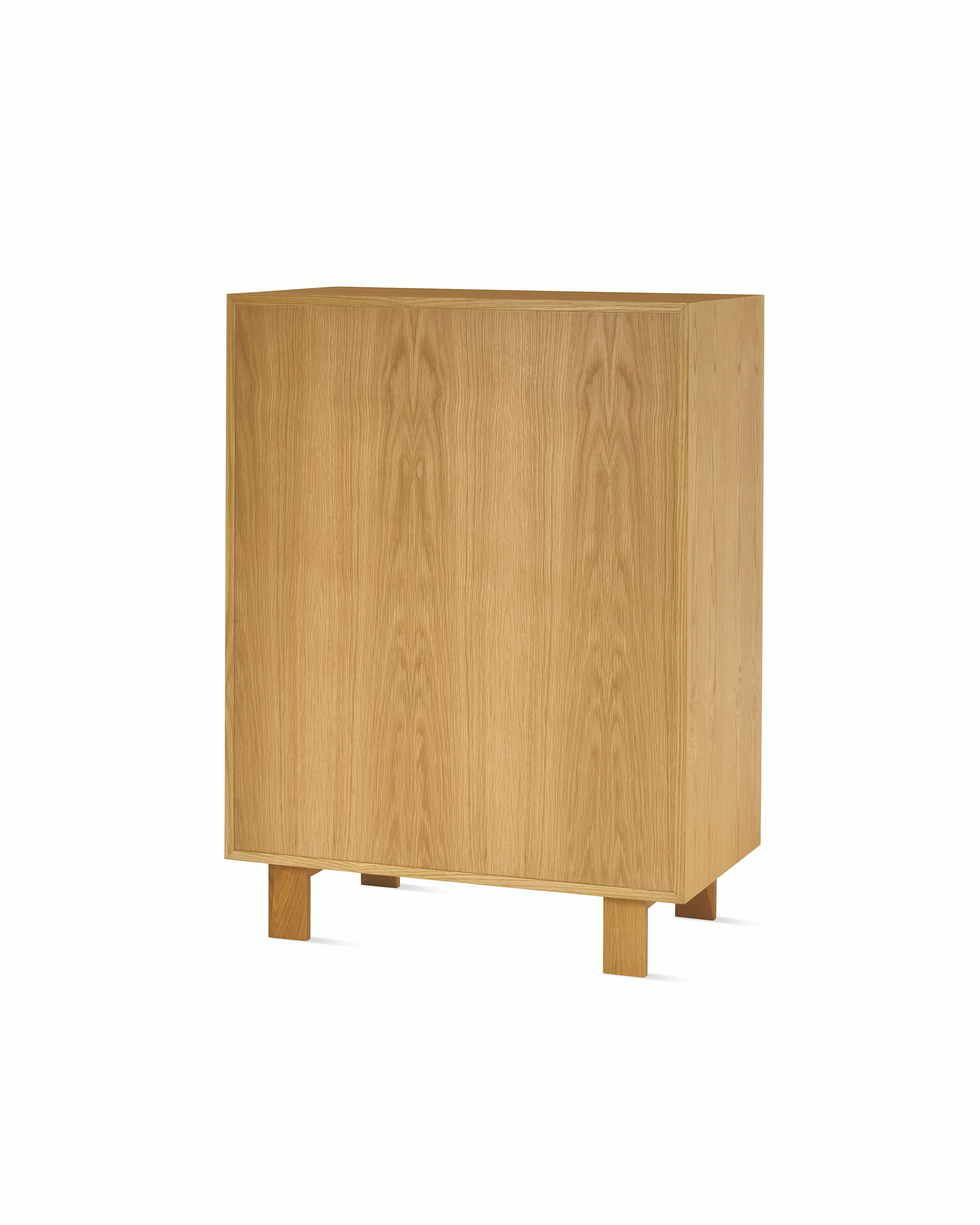 Nelson Basic Cabinet Series Console in natural oak, two doors, three drawers, standard square legs, wavy pulls.