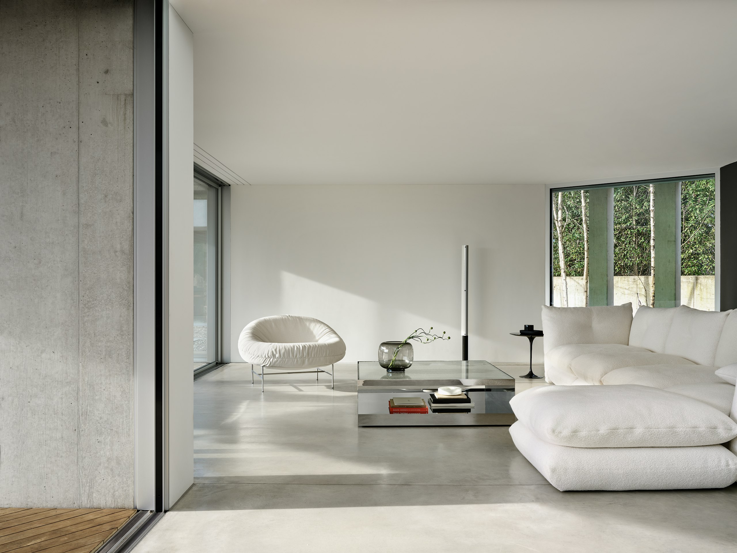 Bun Lounge Chair, D'Urso Coffee Table in Stainless and Pillo Sofa and Ottoman