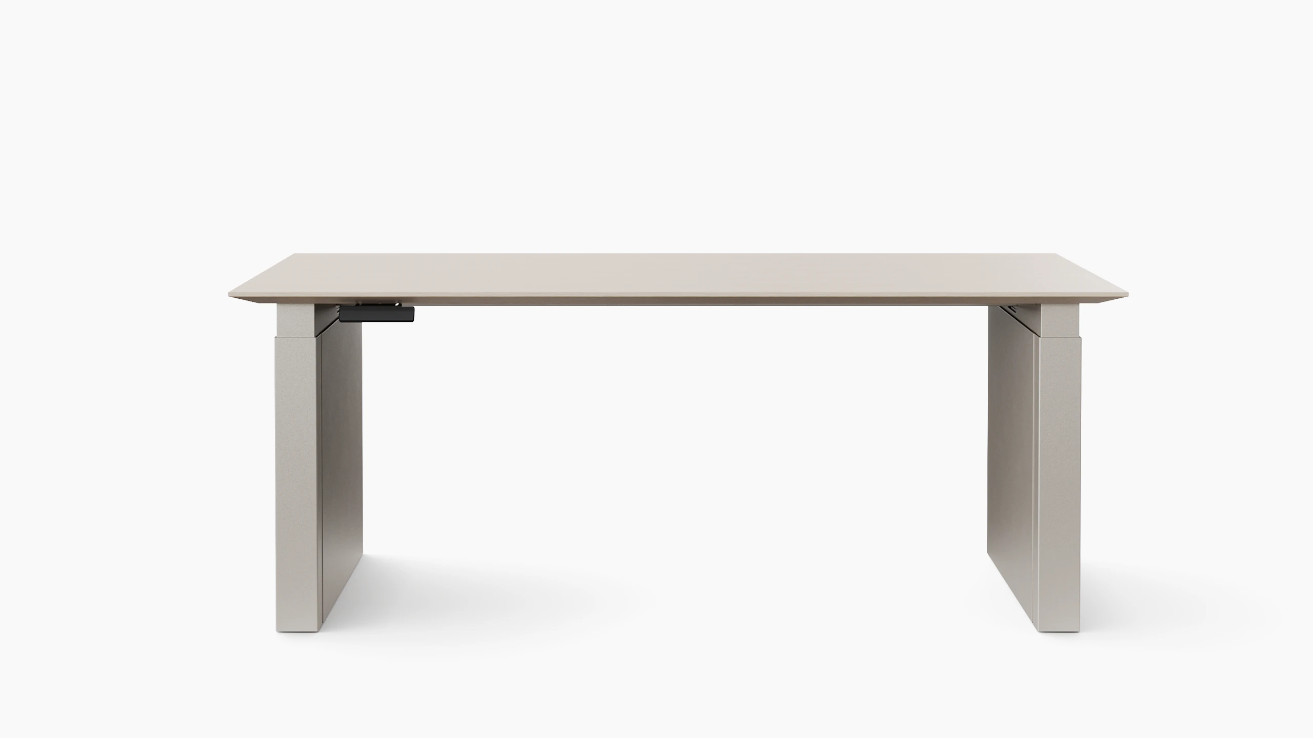 A height adjustable table with shrouded legs is shown in light finishes.