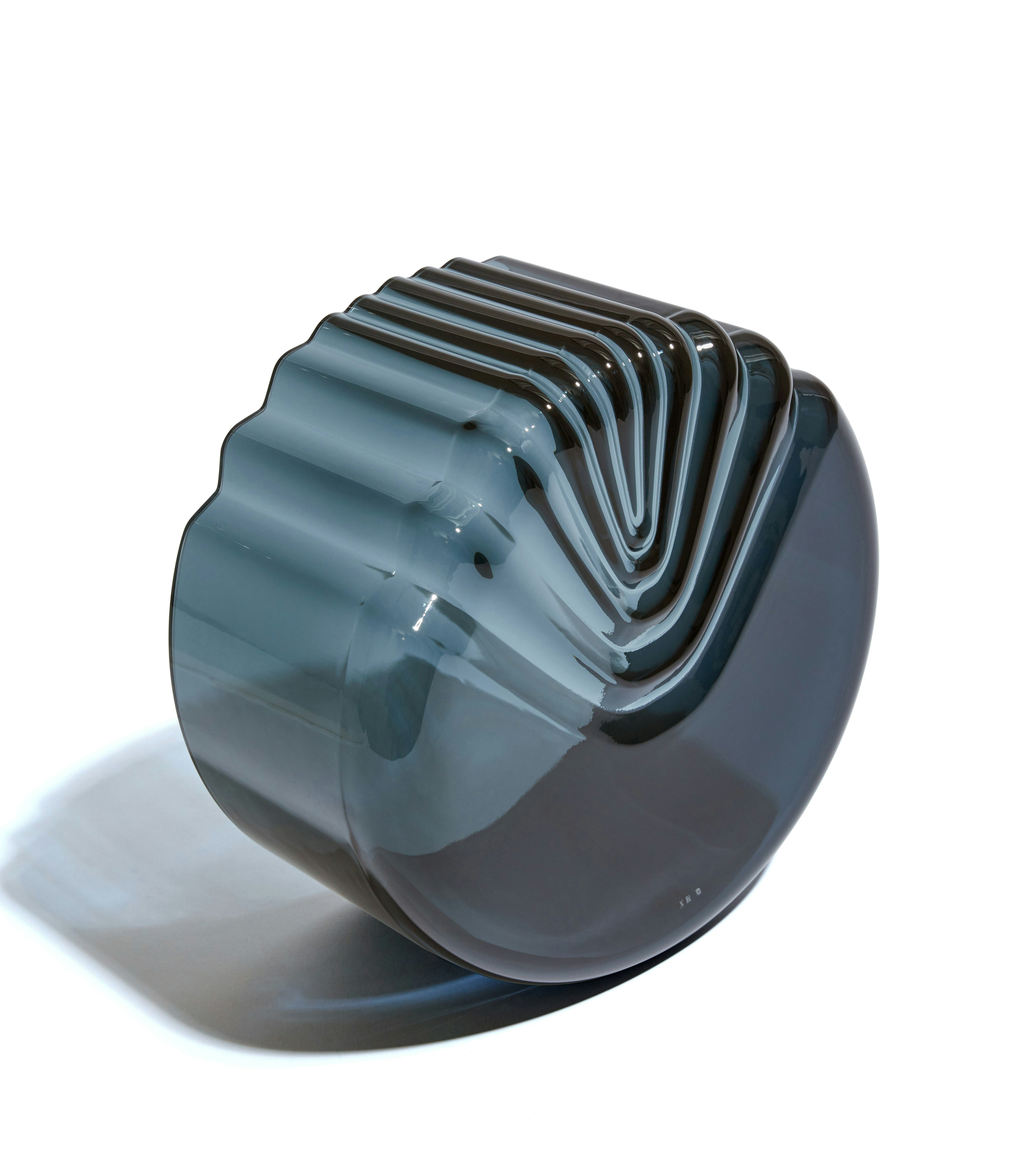 A Pulse Bowl in Dark Blue viewed from an angle.