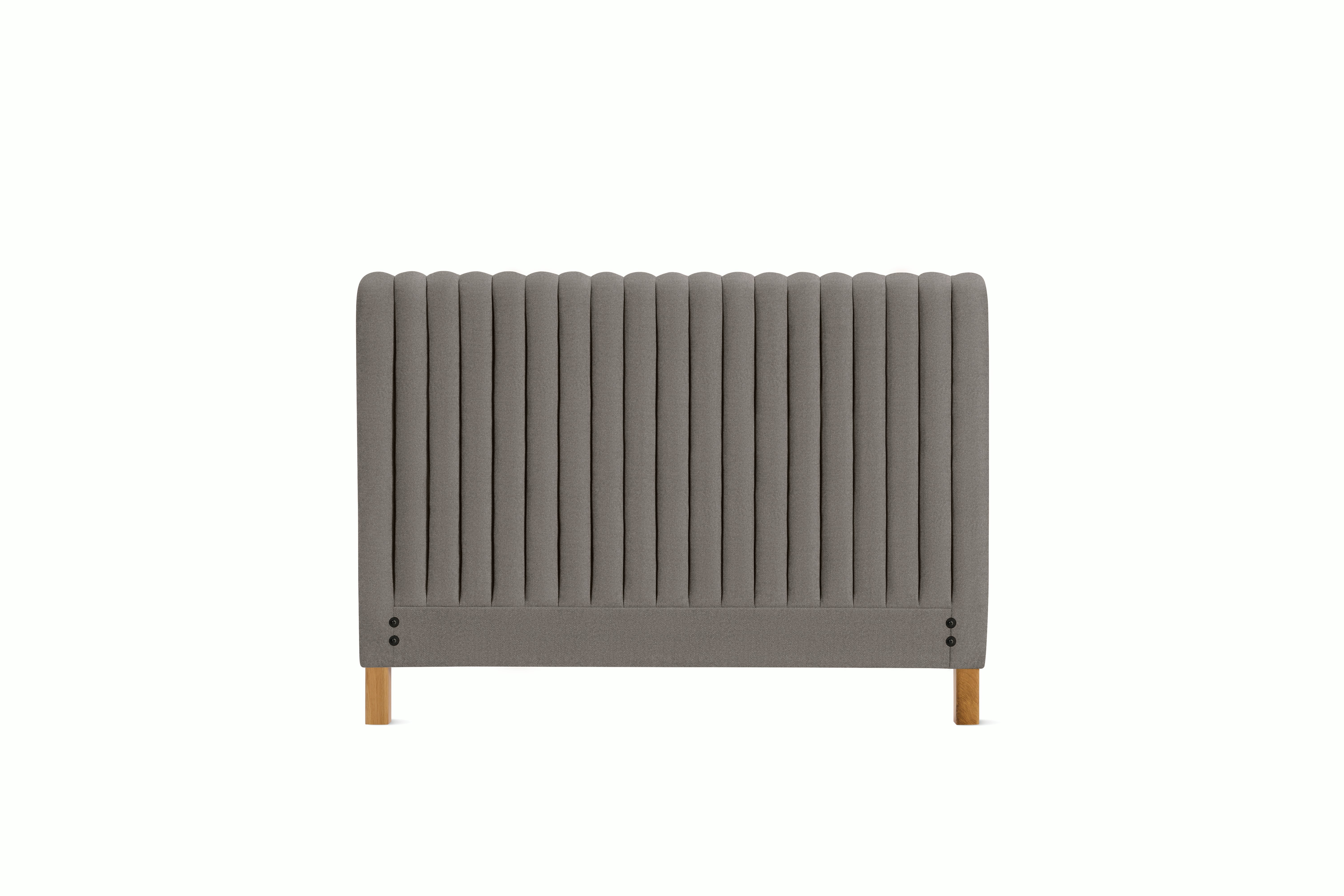 A Charlotte Headboard in Plutonic viewed from an angle.