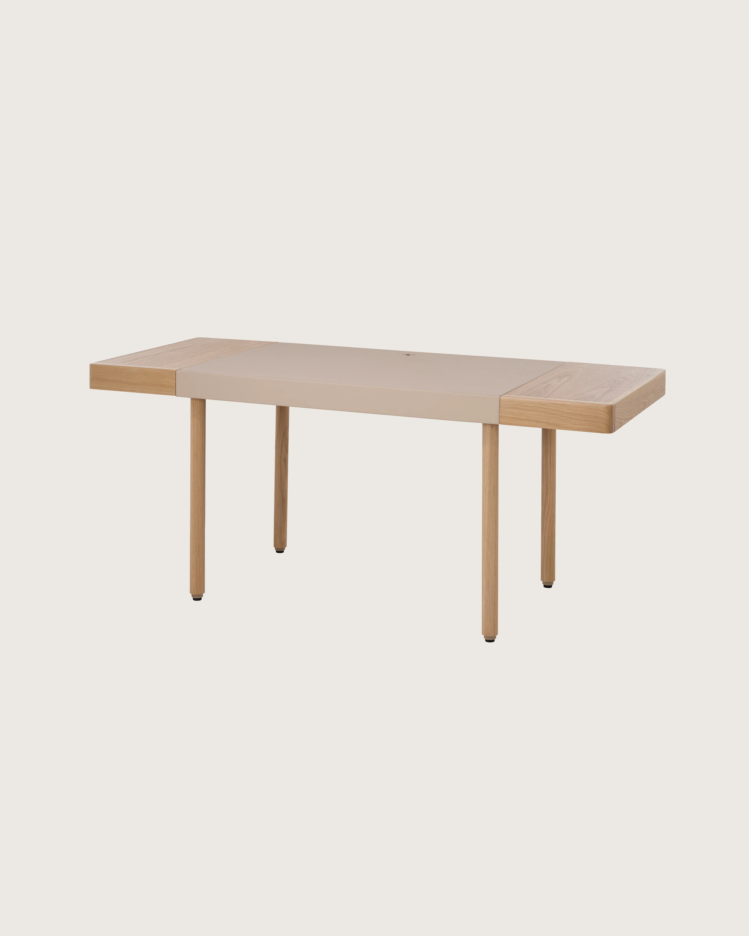 New Canaan Leatherwrap Sit-to-Stand Desk in Oak and Champagne Leather, two drawers, angled view.