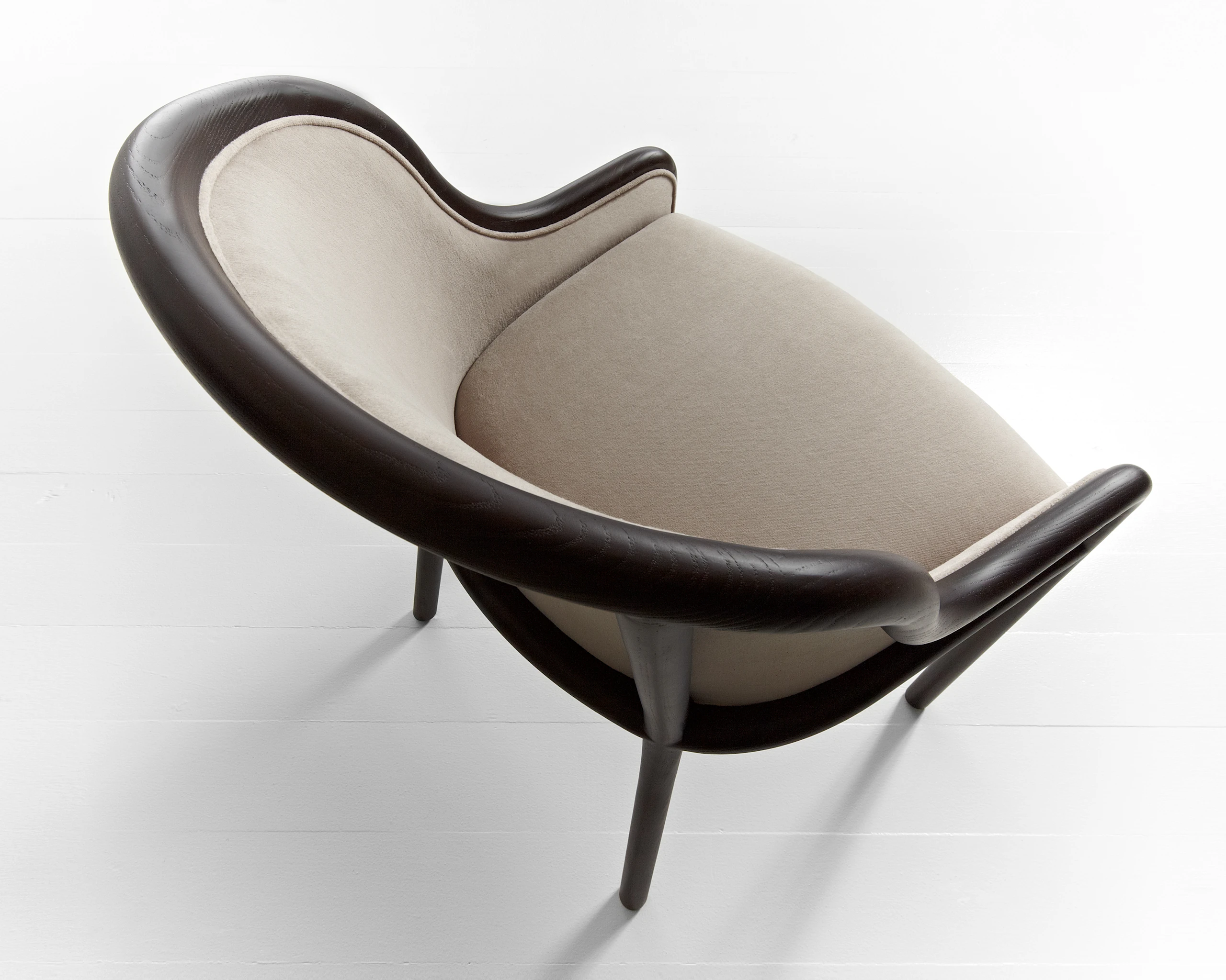 A Landmark Chair upholstered in a Hollandaise textile.