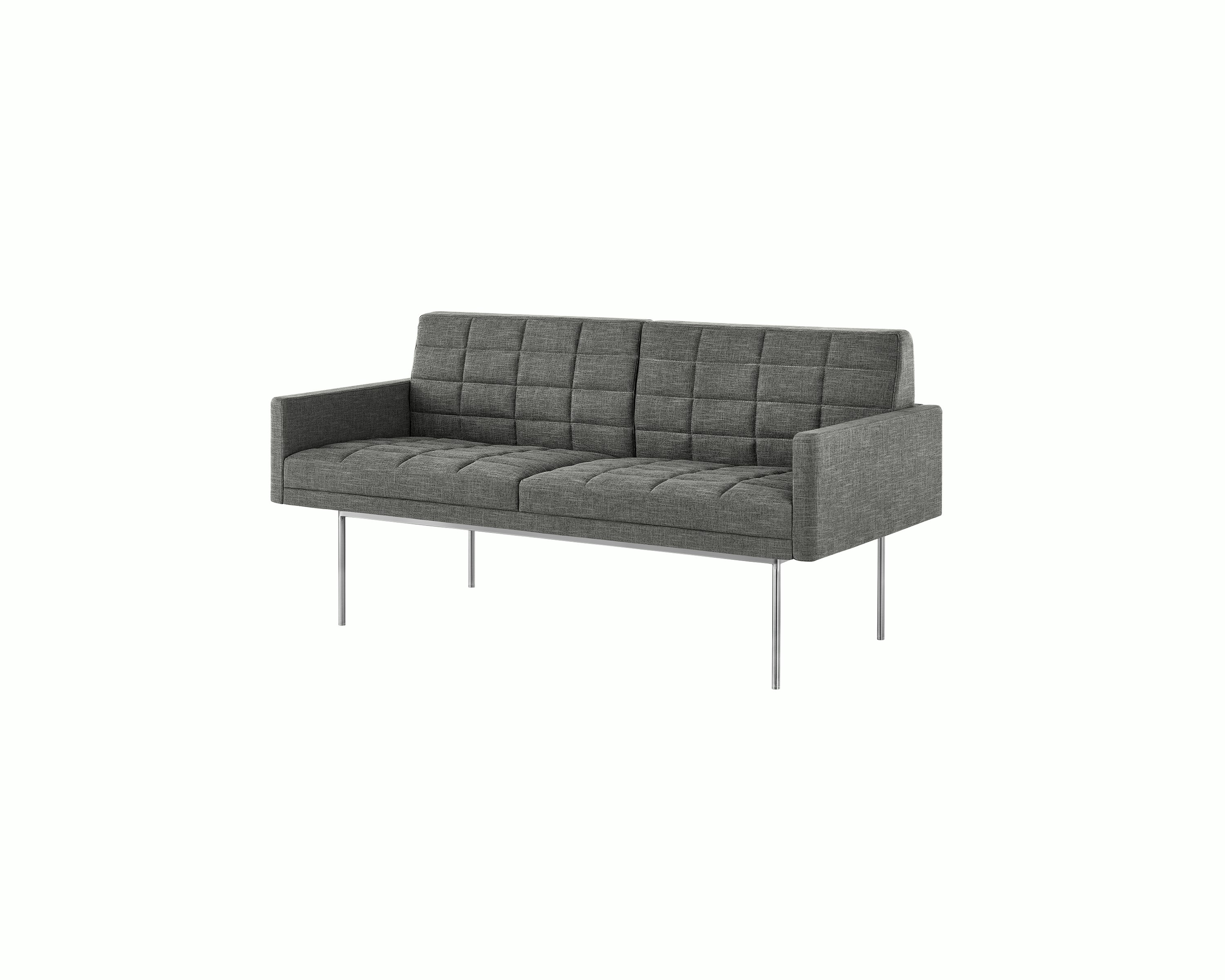 A quilted Tuxedo Settee with arms, upholstered in a light grey fabric with a metal base, viewed at an angle.