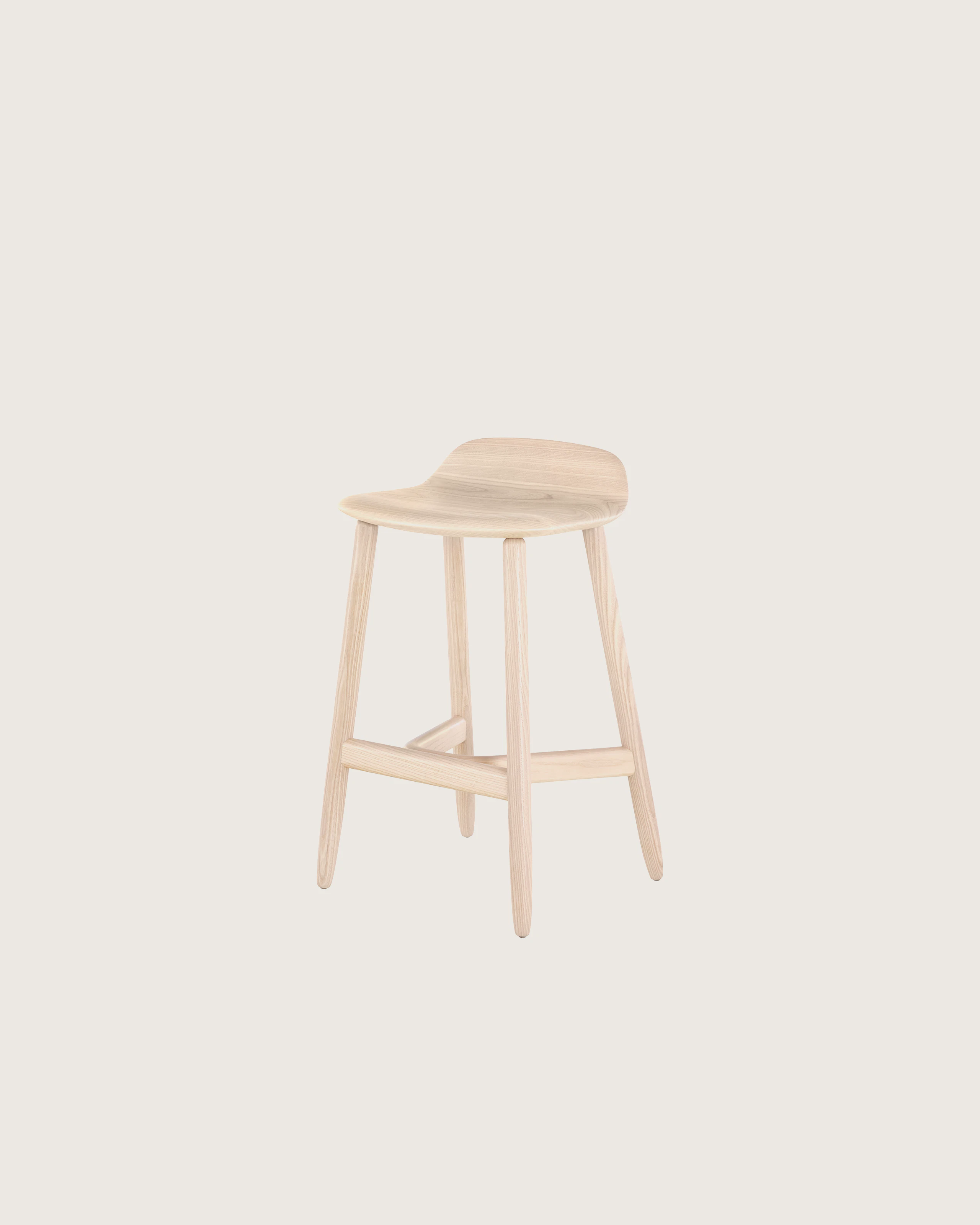 Angled view of a counter-height wood Crosshatch Stool with a light finish.