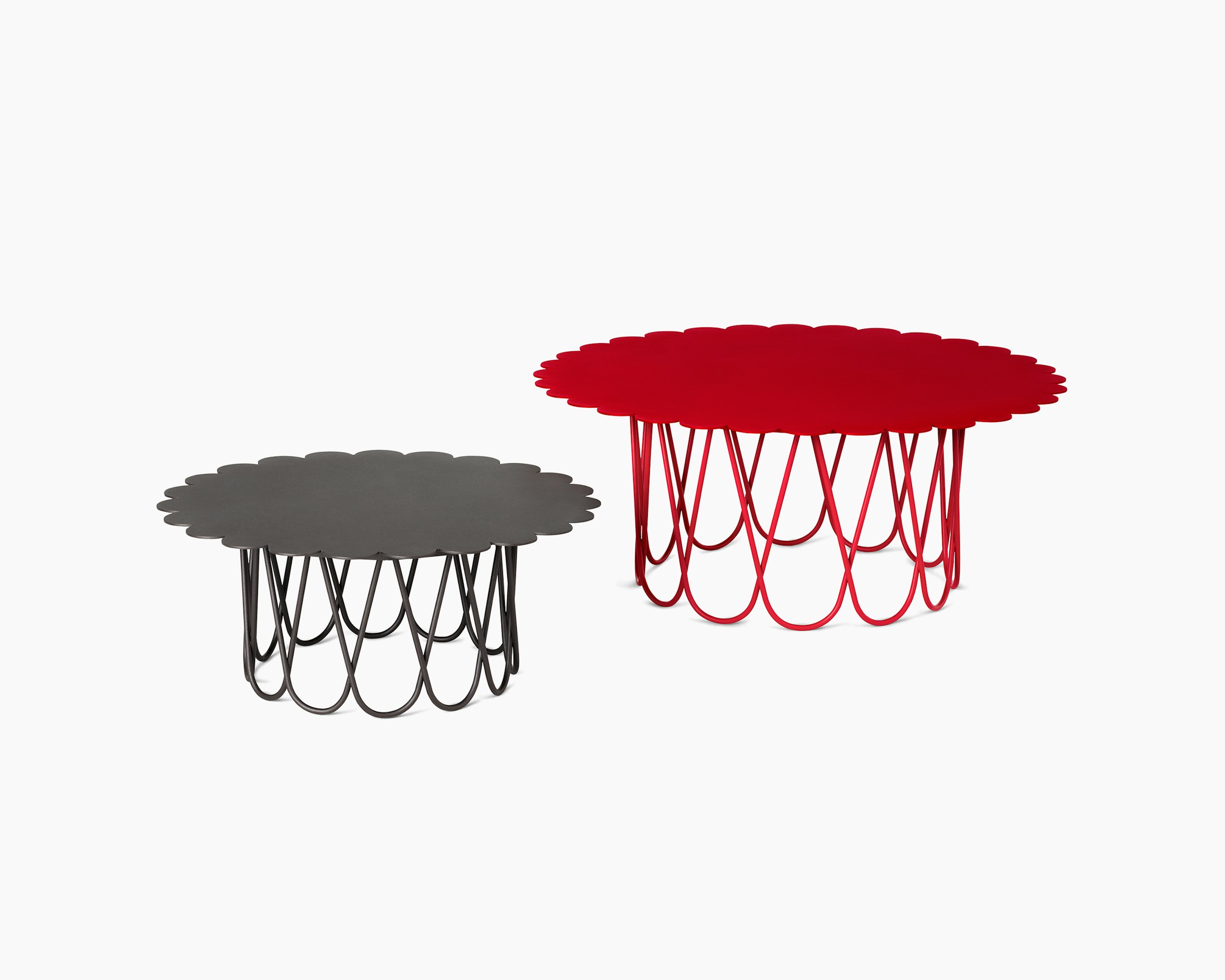 Girard Flower Tables on white background, small black table and large red table.
