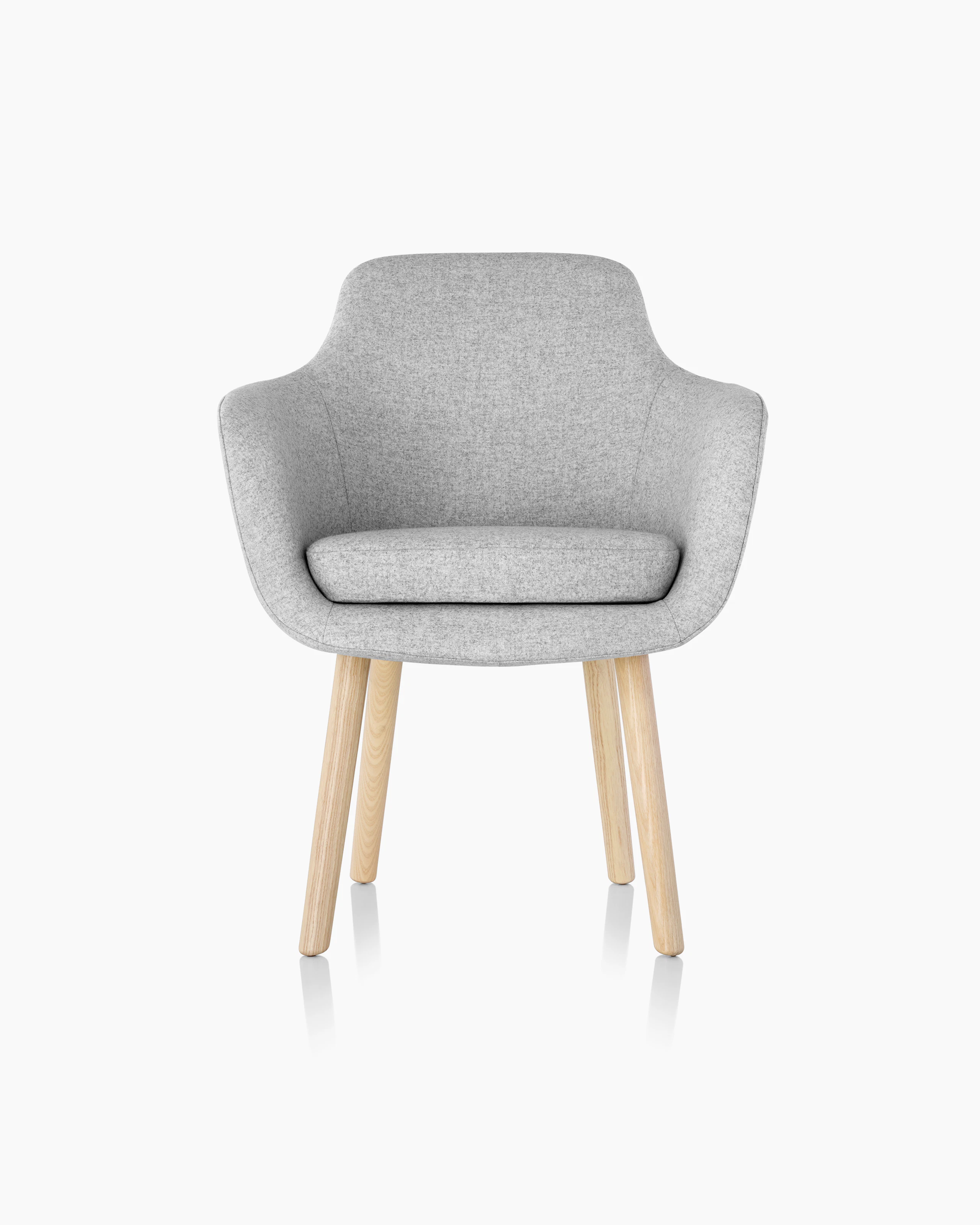 A Saiba Side Chair with light gray upholstery and wood legs in a light finish, viewed from the front.