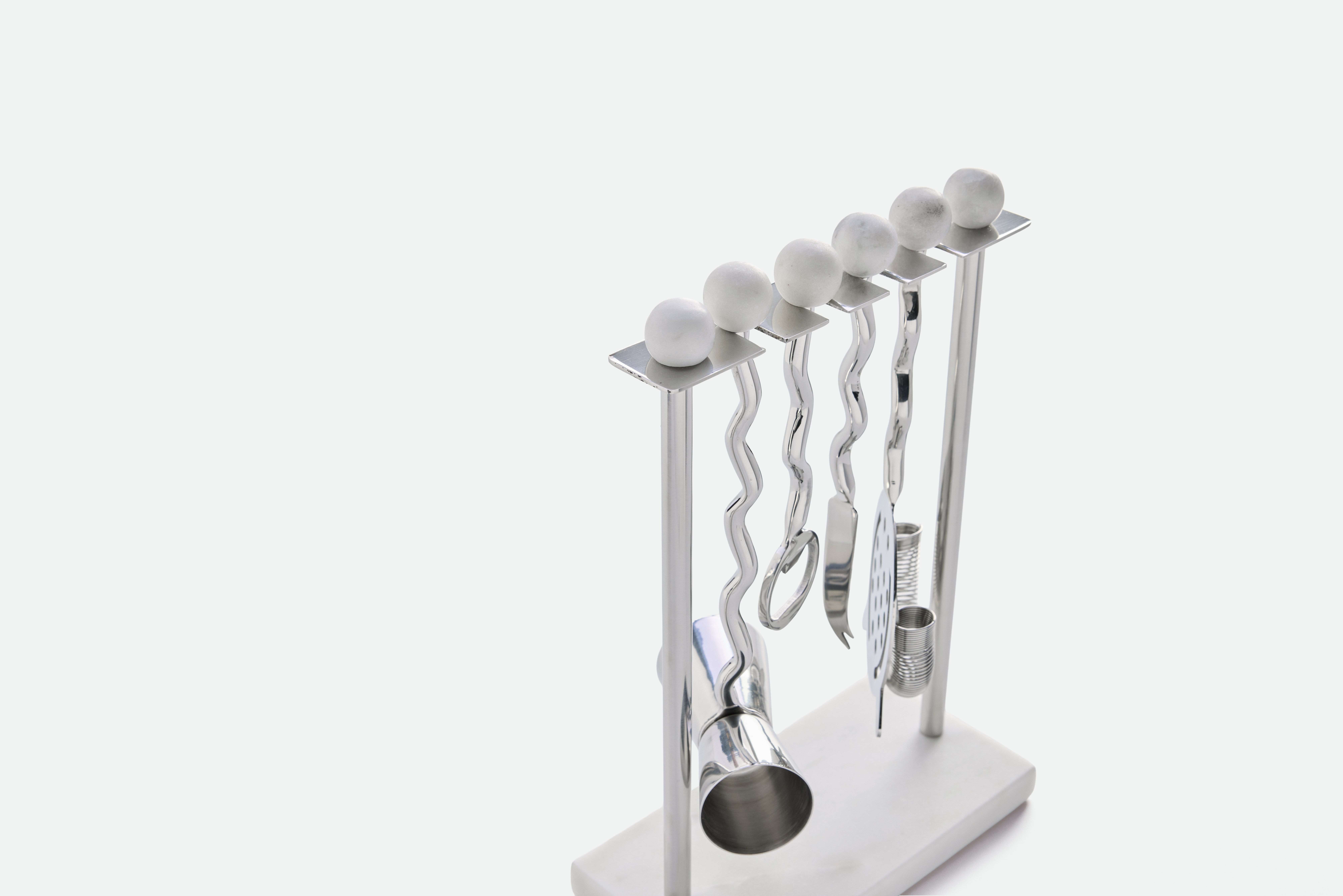 A detailed look at a June Bar Set in Stainless Steel / Marble.