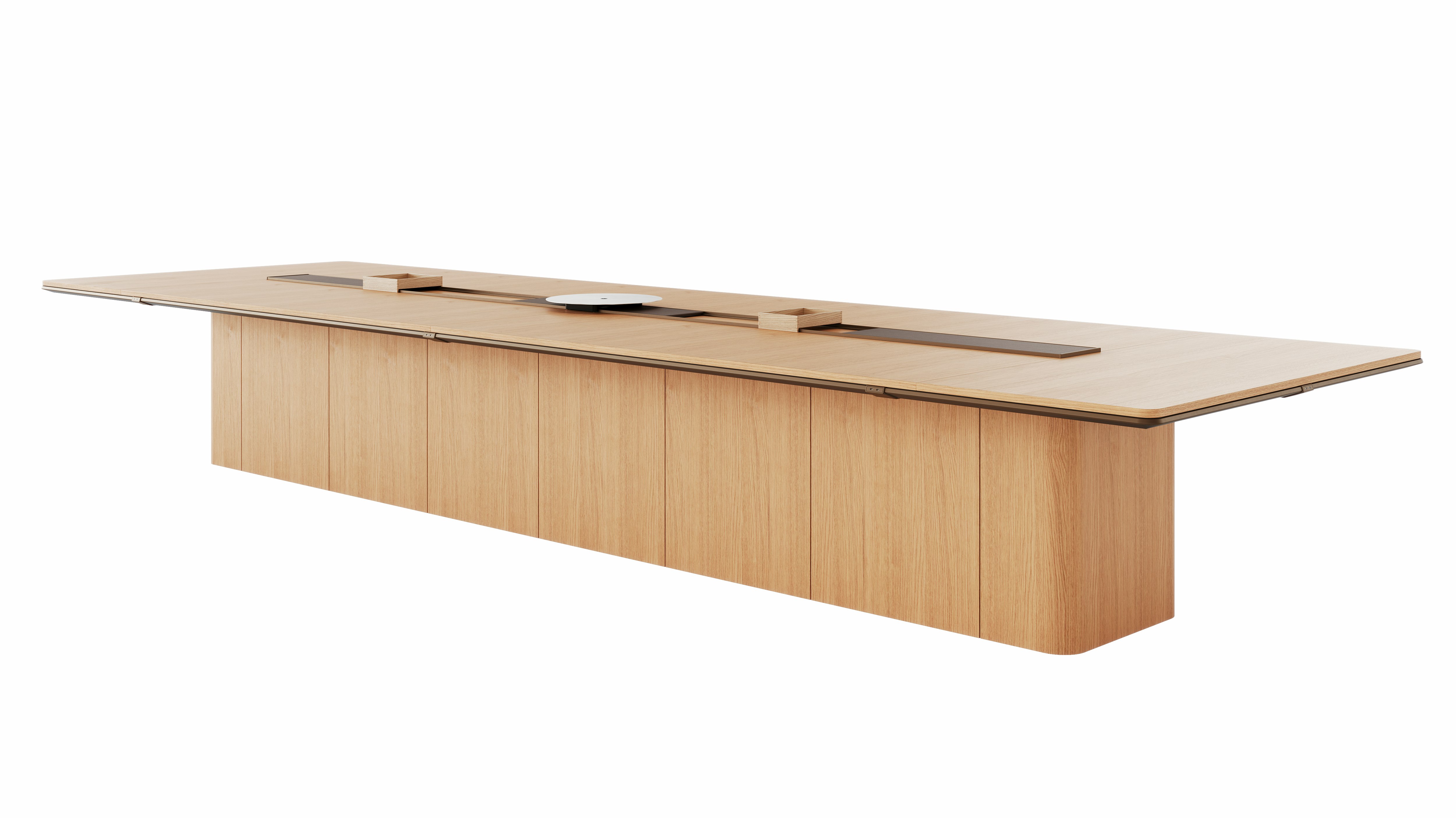 60"×204"Ascent Conference Table designed by EOOS in Natural Rift Cut Oak with a plinth base, central power trough, an AV platform, and accessory trays, viewed at an angle.