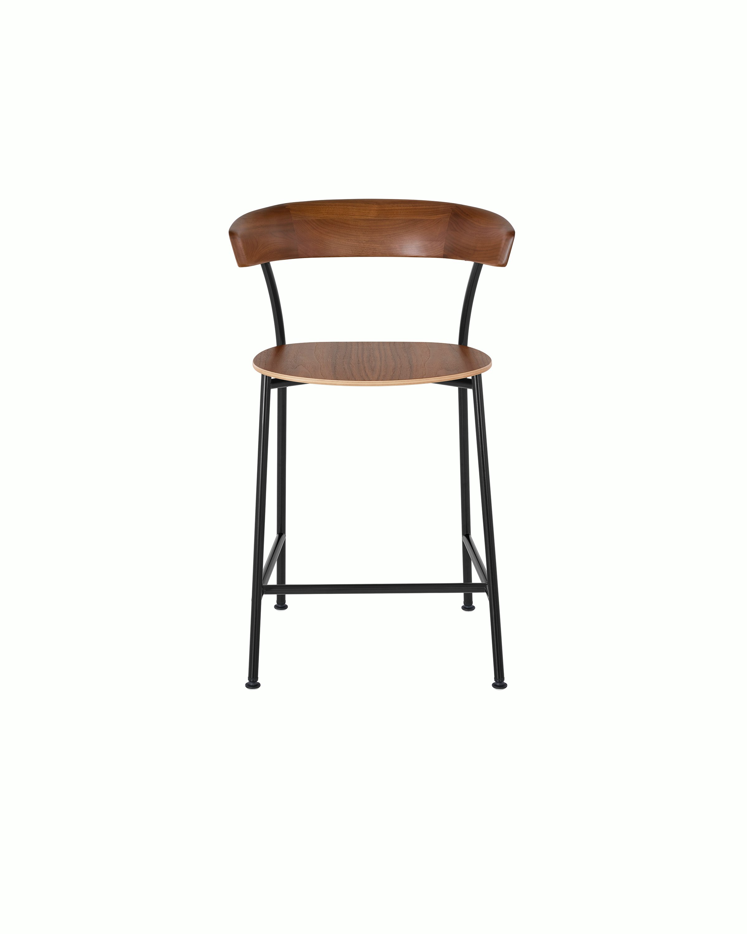 A Leeway Stool with a black metal frame and a wood backrest and seat in a medium finish, viewed from the front.