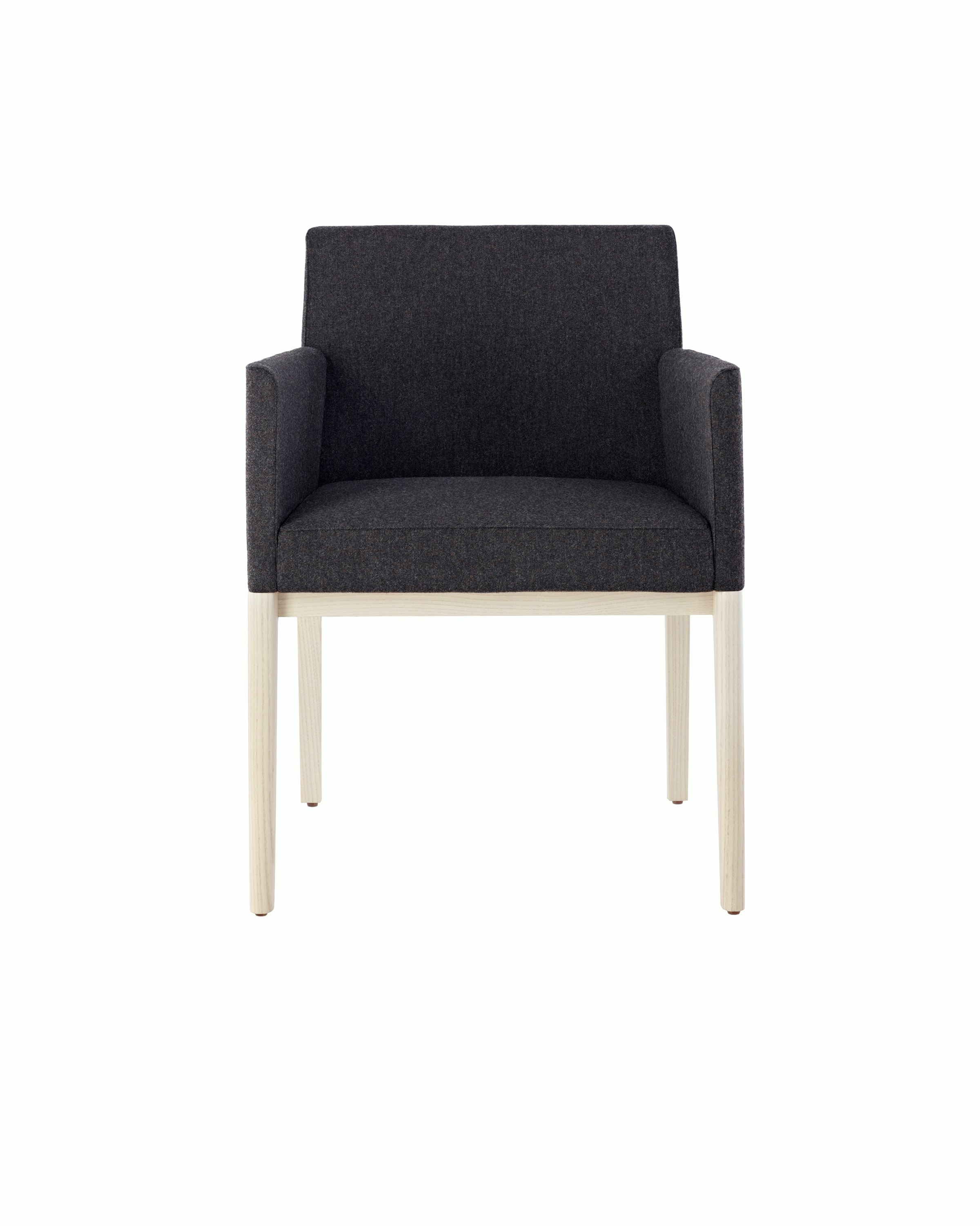 A Nessel side chair with black fabric upholstery, wraparound arms, and a wood frame with a light finish, viewed from the front.