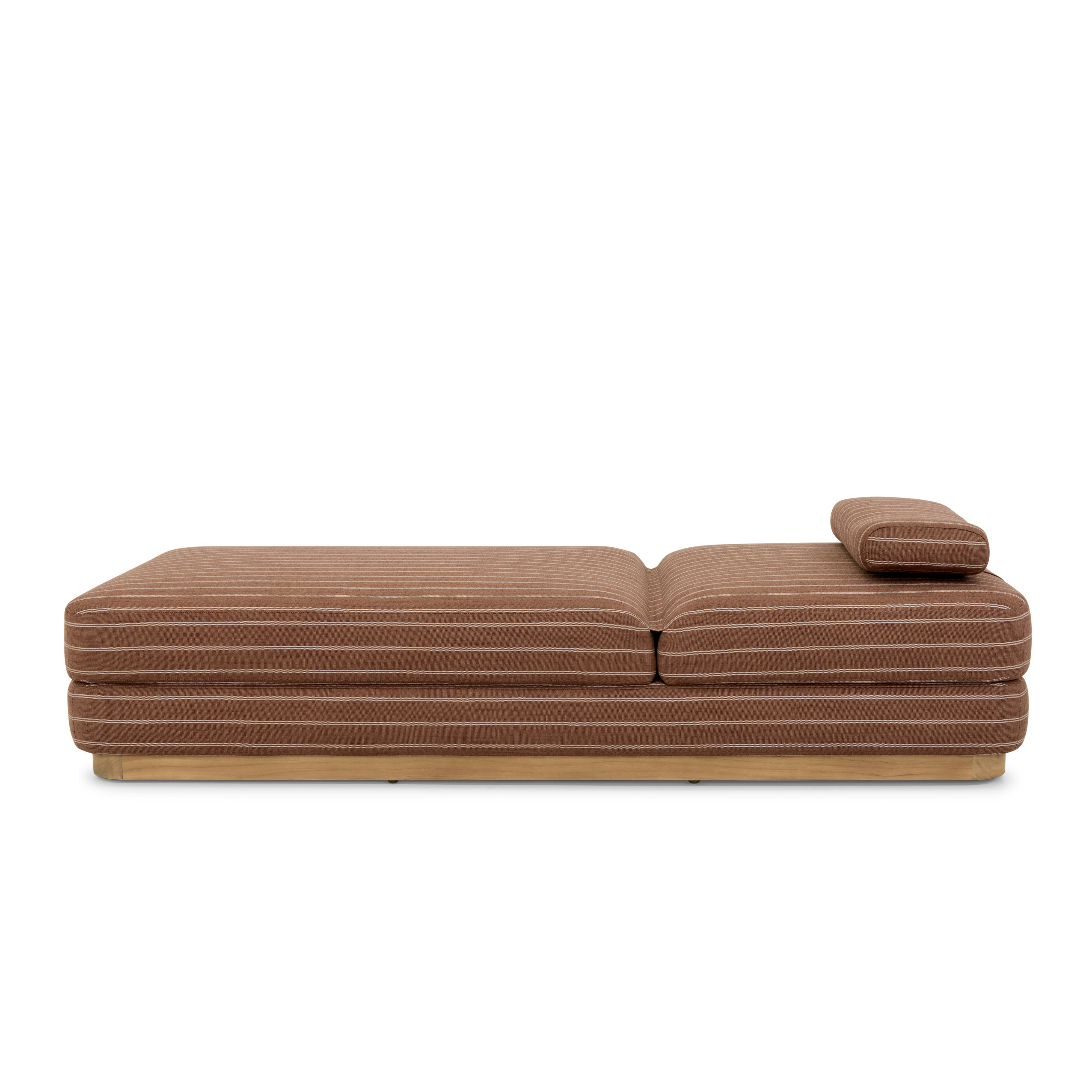 A Stack Outdoor Chaise in Terra Rossa viewed from the side.