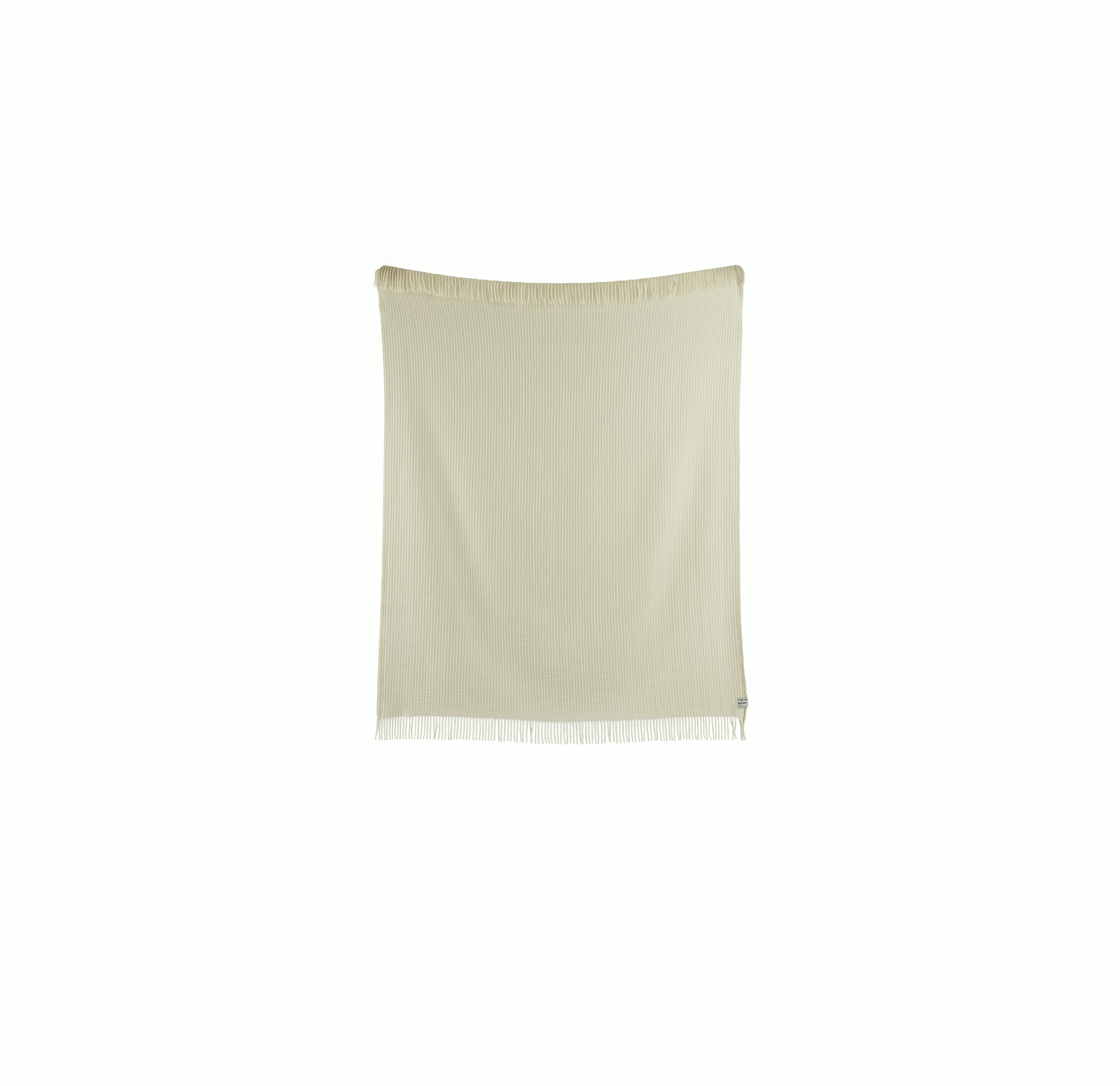 A Vega Throw in Natural viewed from behind.