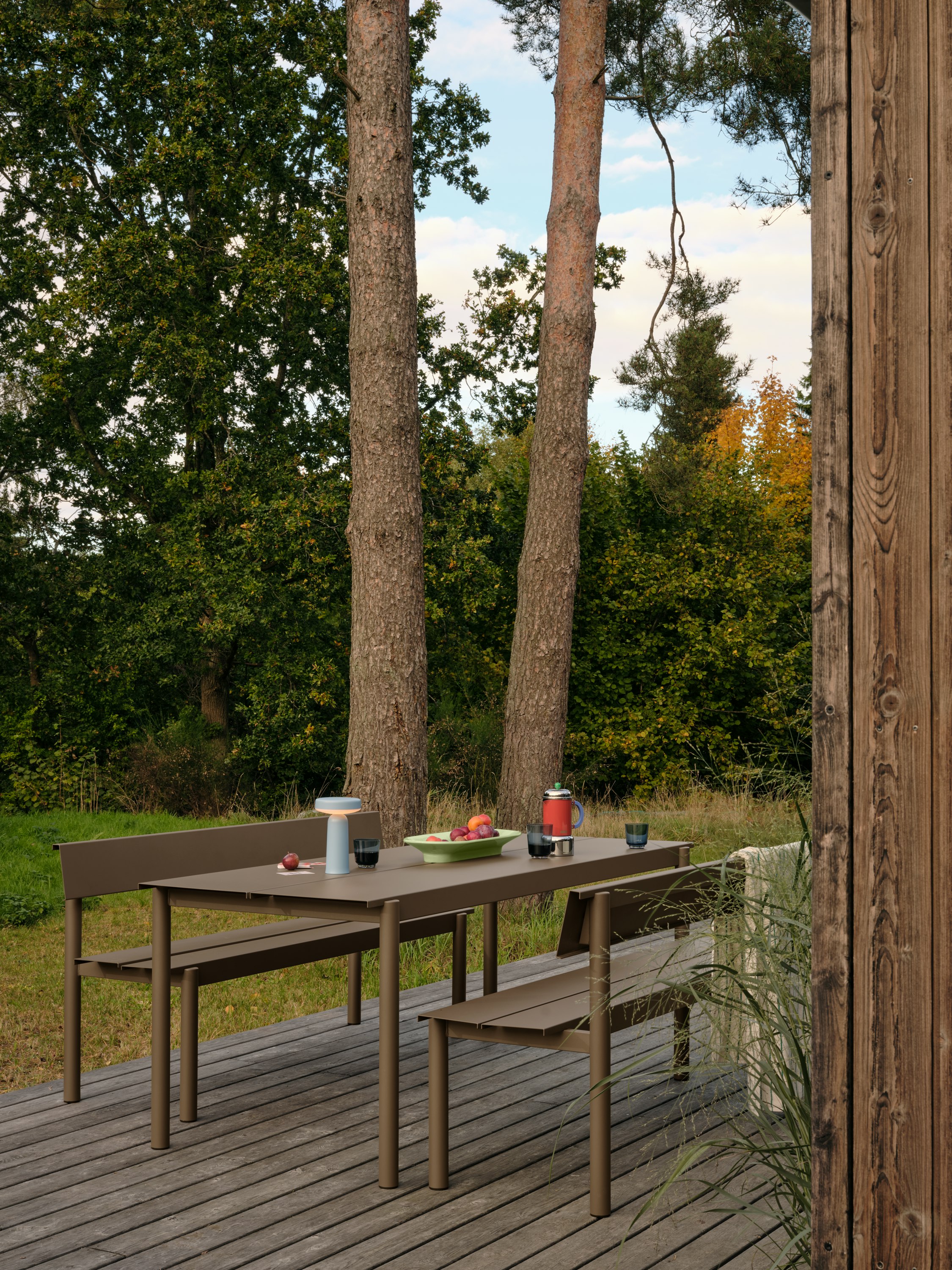 Linear Steel Bench 170 cm w. Backrest in Taupe - Linear Steel Table 200 cm in Taupe - Ease Portable Lamp in Light Blue - Mere Bowl in Light Green - Raise Glasses in Dark Blue