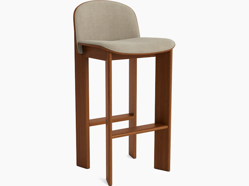 Chisel bar stool in walnut with front upholstery, angled view
