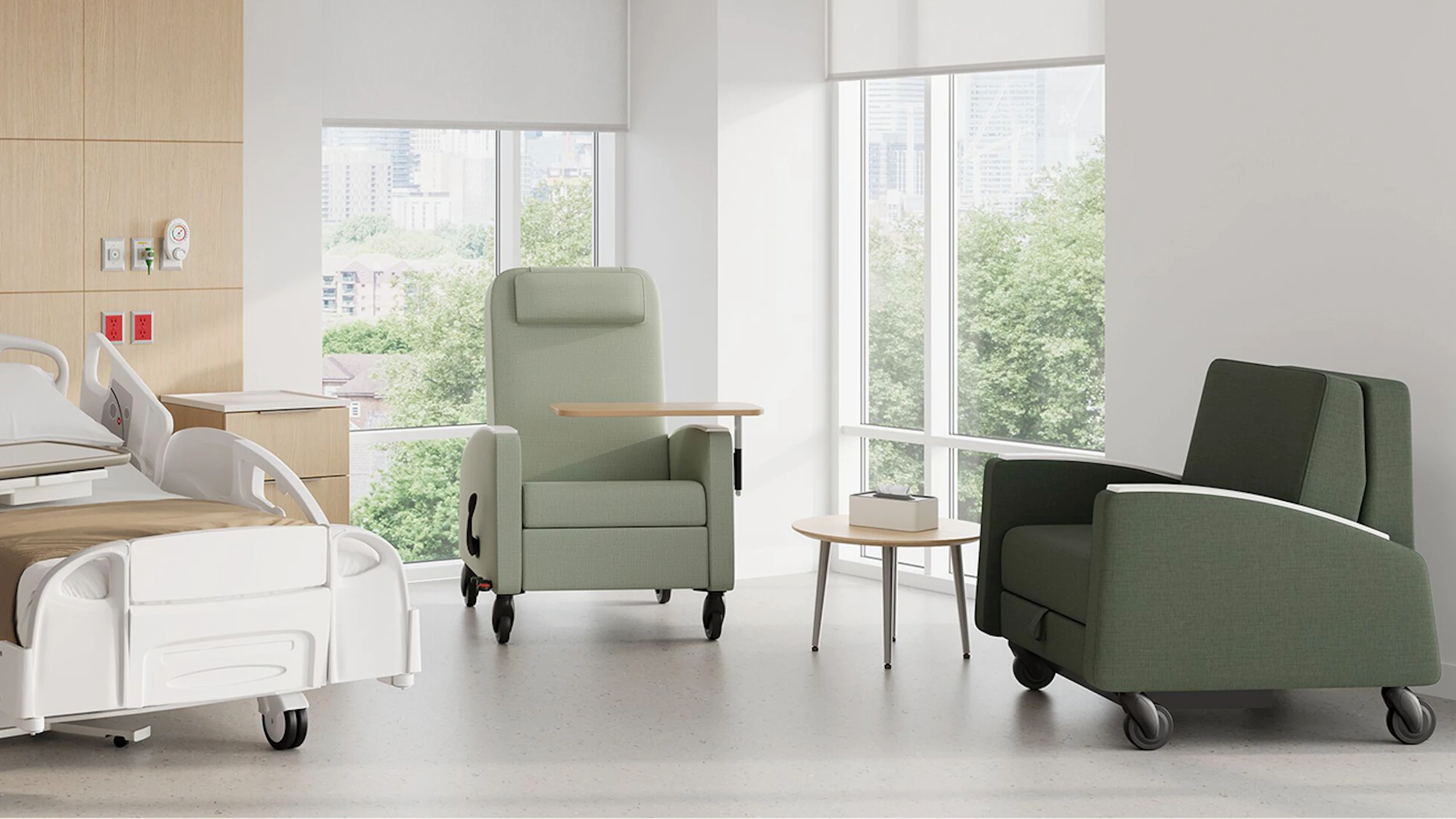 Gemma Recliner, Gemma Sleep Chair and Mora System in a patient room. Featuring Gemma Recliner with adjustable tray table, and both Gemma products with CBS casters.
