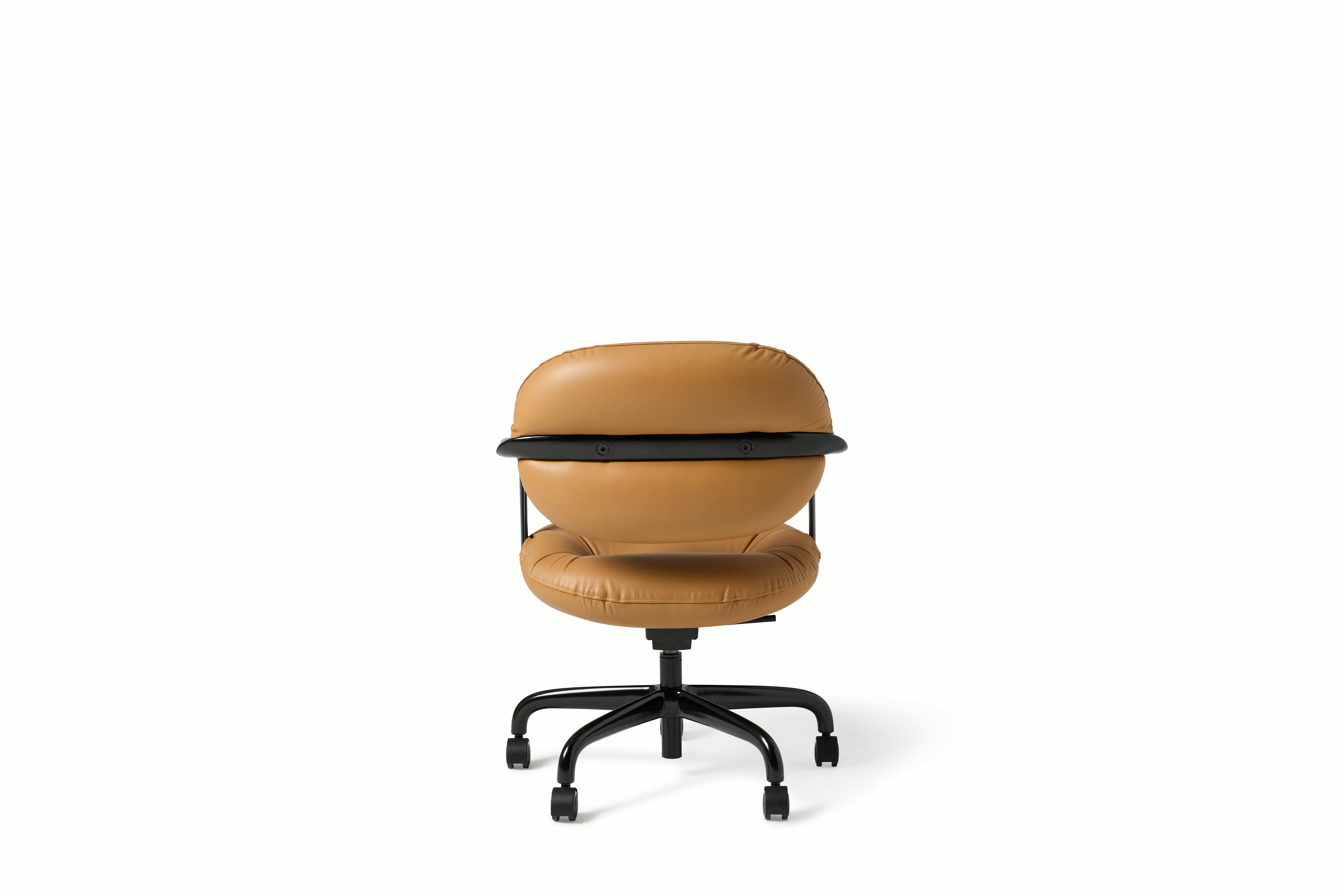 Rear view of a Morrison Hannah chair with a black frame and base with fixed arms and light brown leather upholstery.