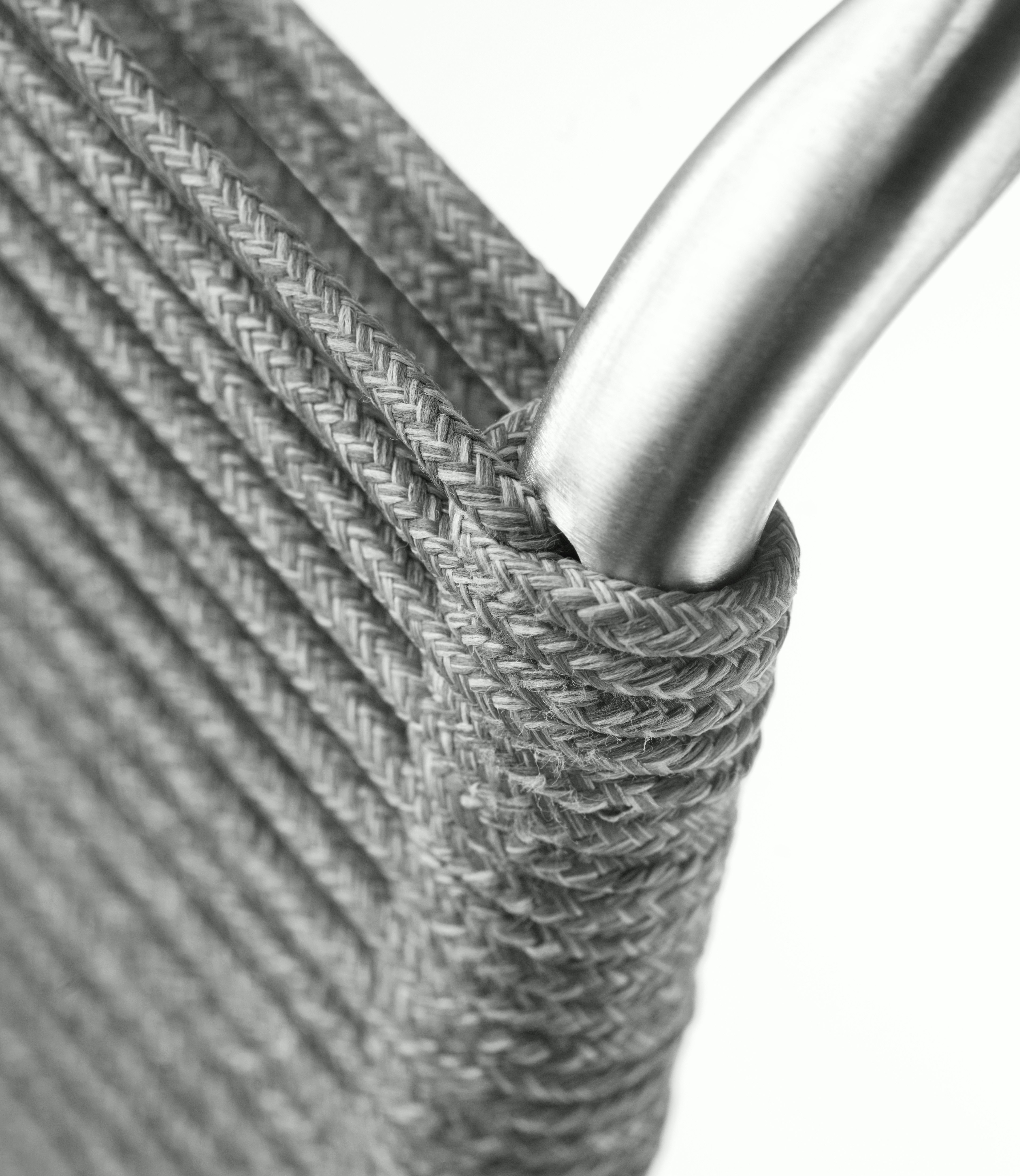 A detailed look at a Teglgaard Outdoor Dining Chair in Light Grey.