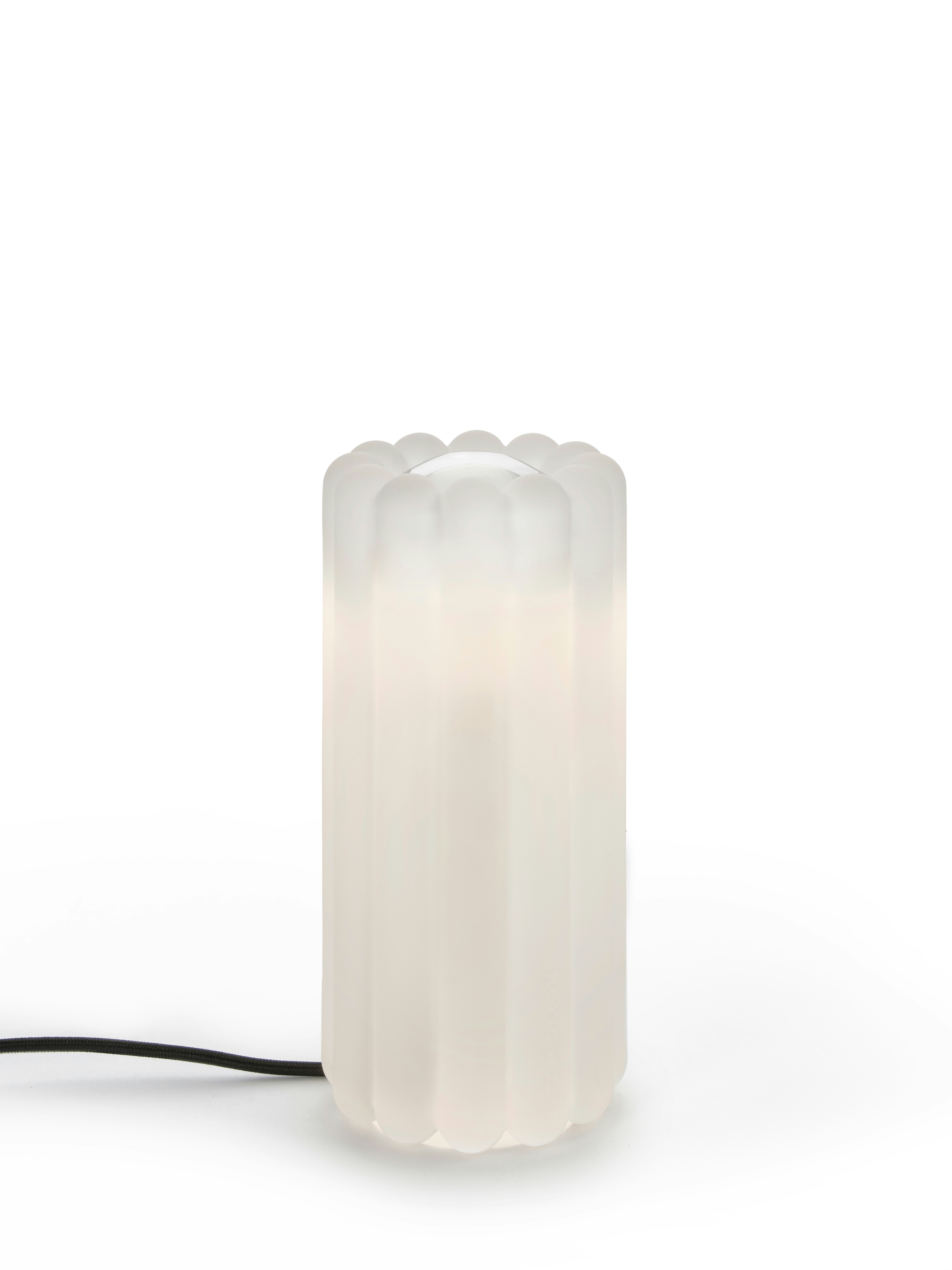A Press Table Lamp in Glass viewed from the front.